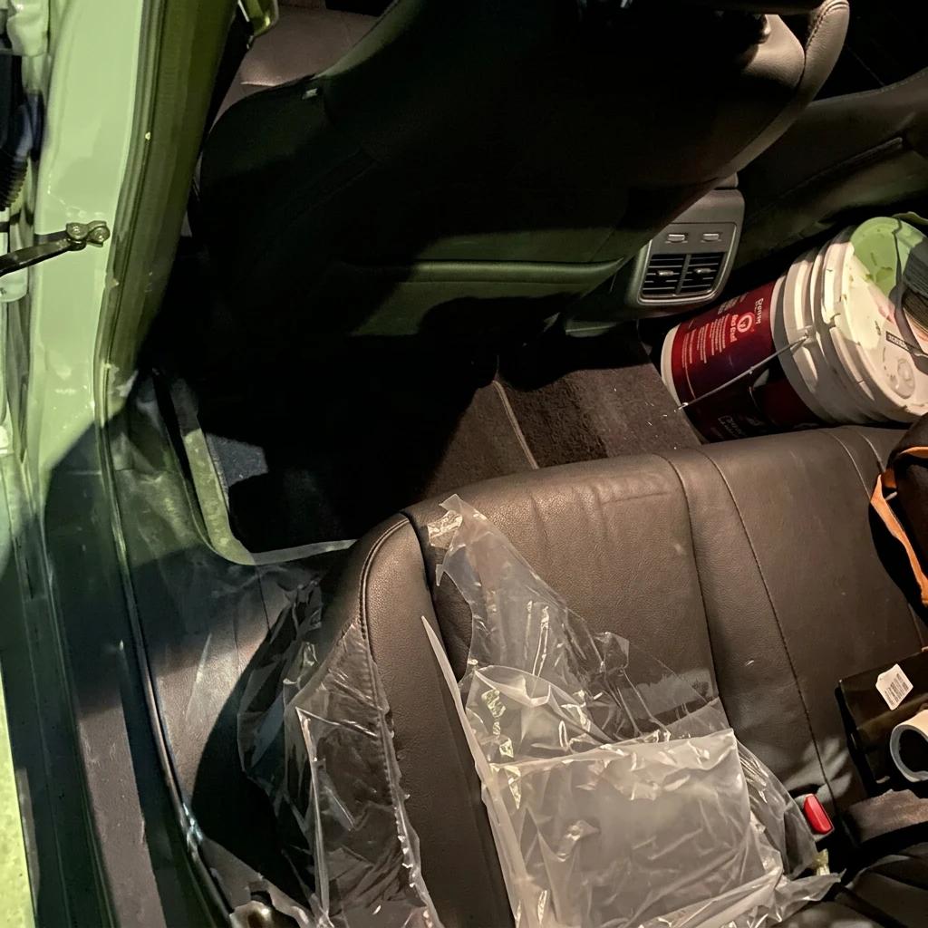 Interior Steam Cleaning Black Seat — professional auto detailing work completed at Fresh Auto Spa in Port Chester, NY