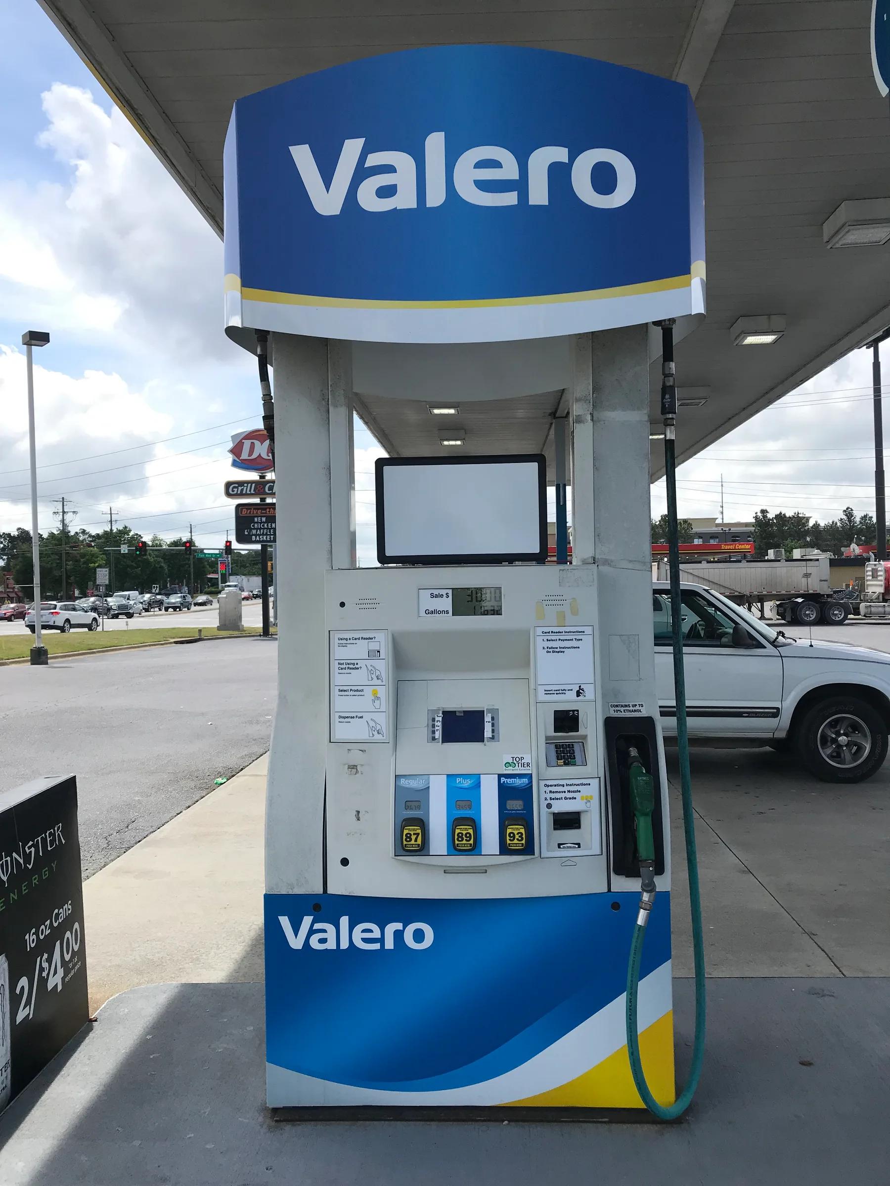 Valero dispenser with a blue Valero topper sign