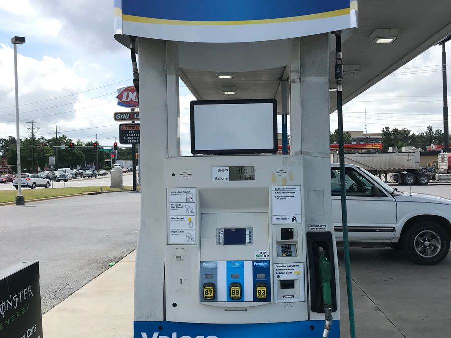 Valero dispenser with a blue Valero topper sign
