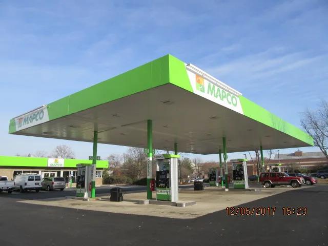 Mapco canopy with a bright green fascia over dispensers