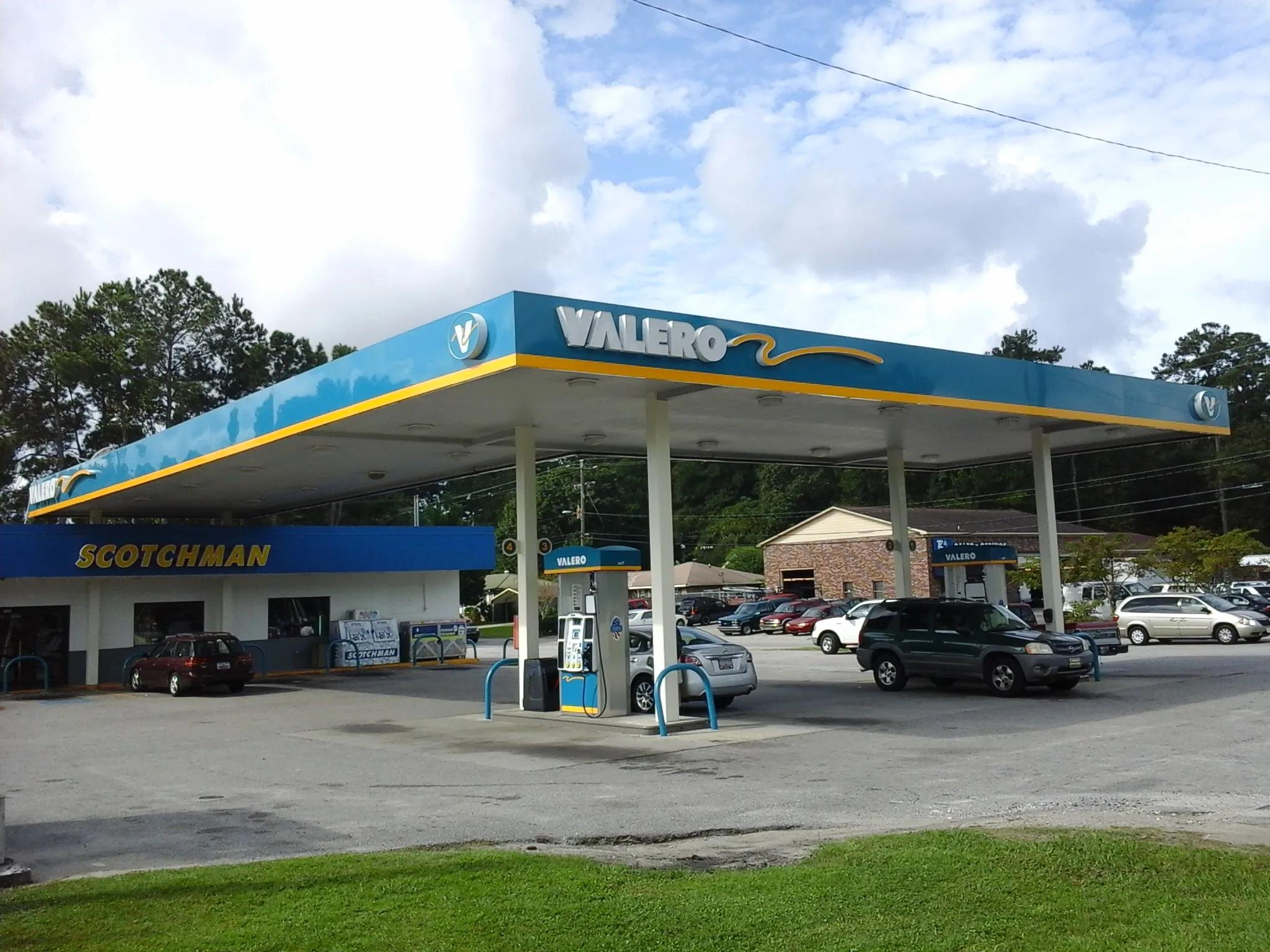 Valero canopy with a blue fascia in front of a store