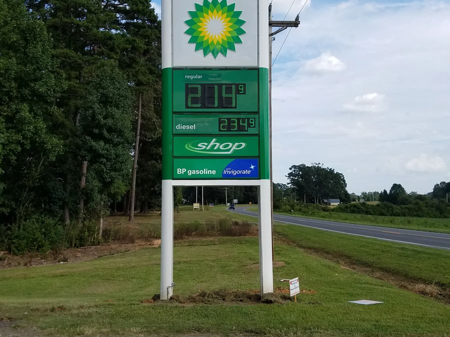 BP pylon price sign with LED price numerals beside a road