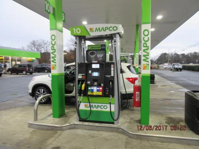Mapco dispenser with green column cladding and a pump number 10 sign