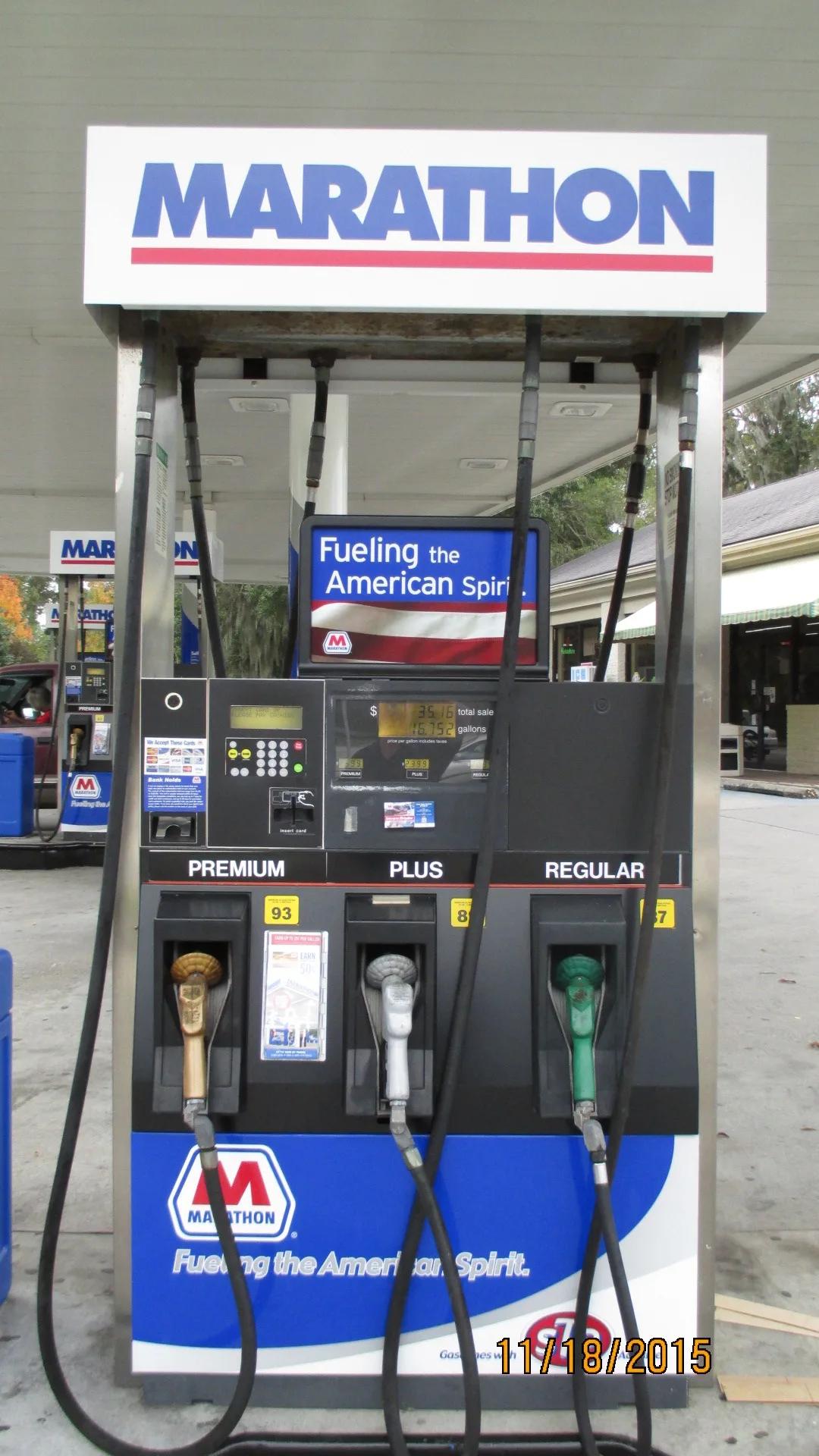 Marathon dispenser with a Marathon topper sign and branded panels