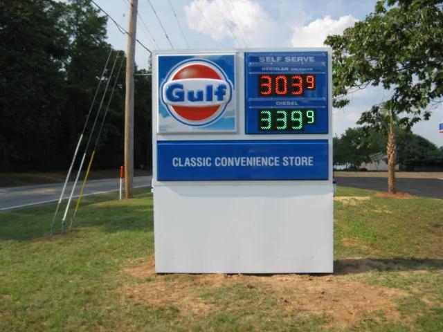 Gulf monument price sign with LED price numerals and a store name panel