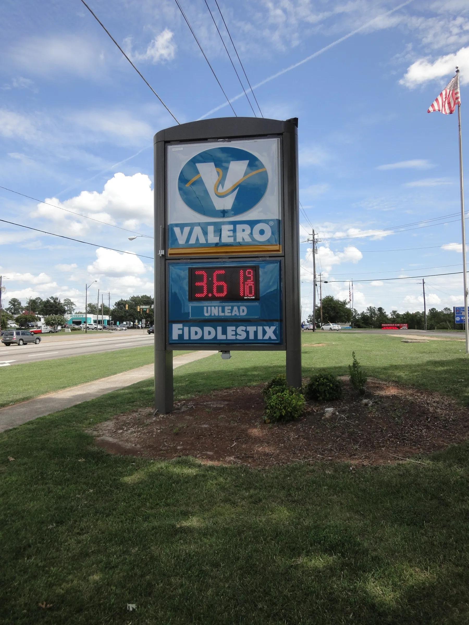 Valero monument price sign with an LED price, on a landscaped base