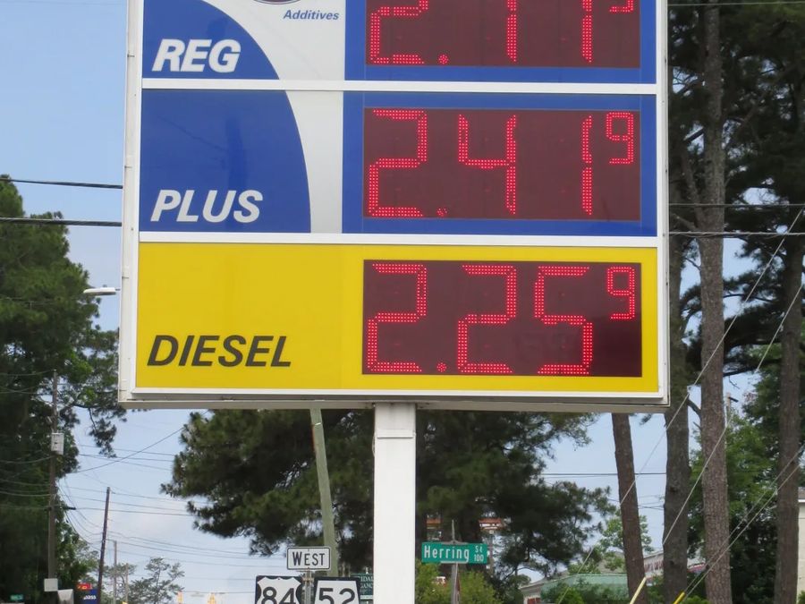 Marathon pylon price sign with red LED price numerals for regular, plus and diesel