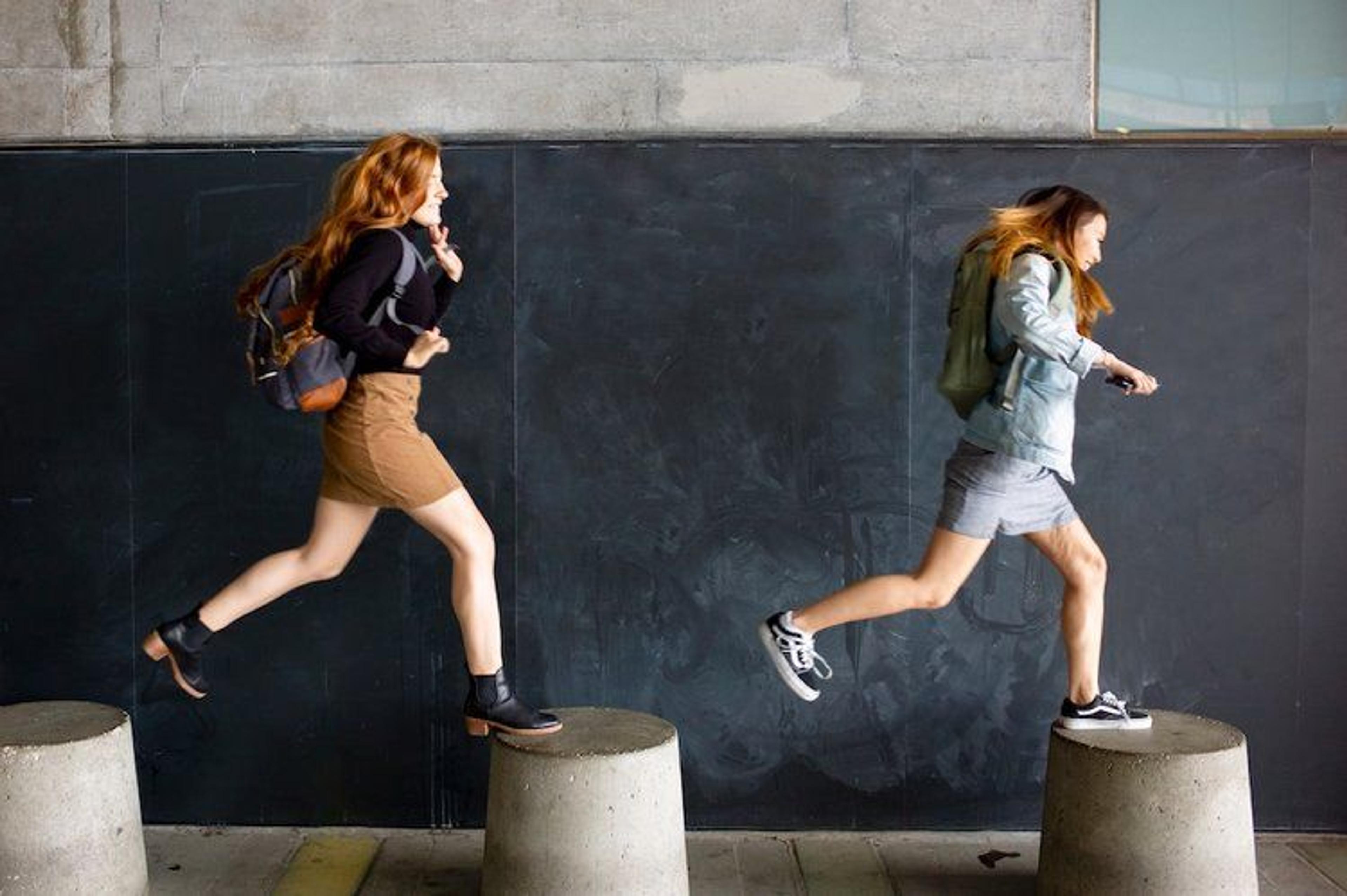 Image of students jumping on platforms
