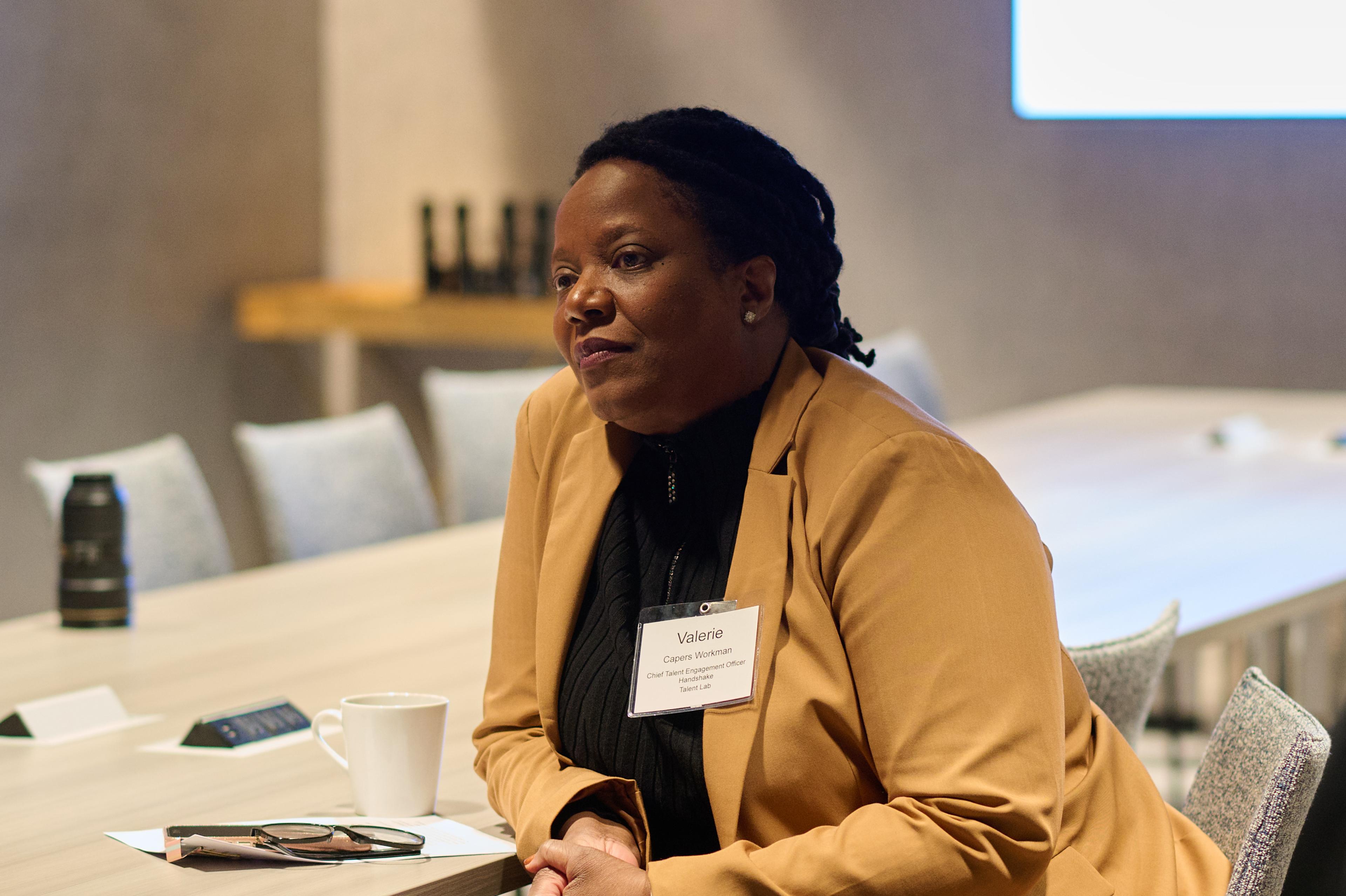 Handshake Chief Talent Engagement Officer Valerie Capers-Workman leads a closed-door session for attendees