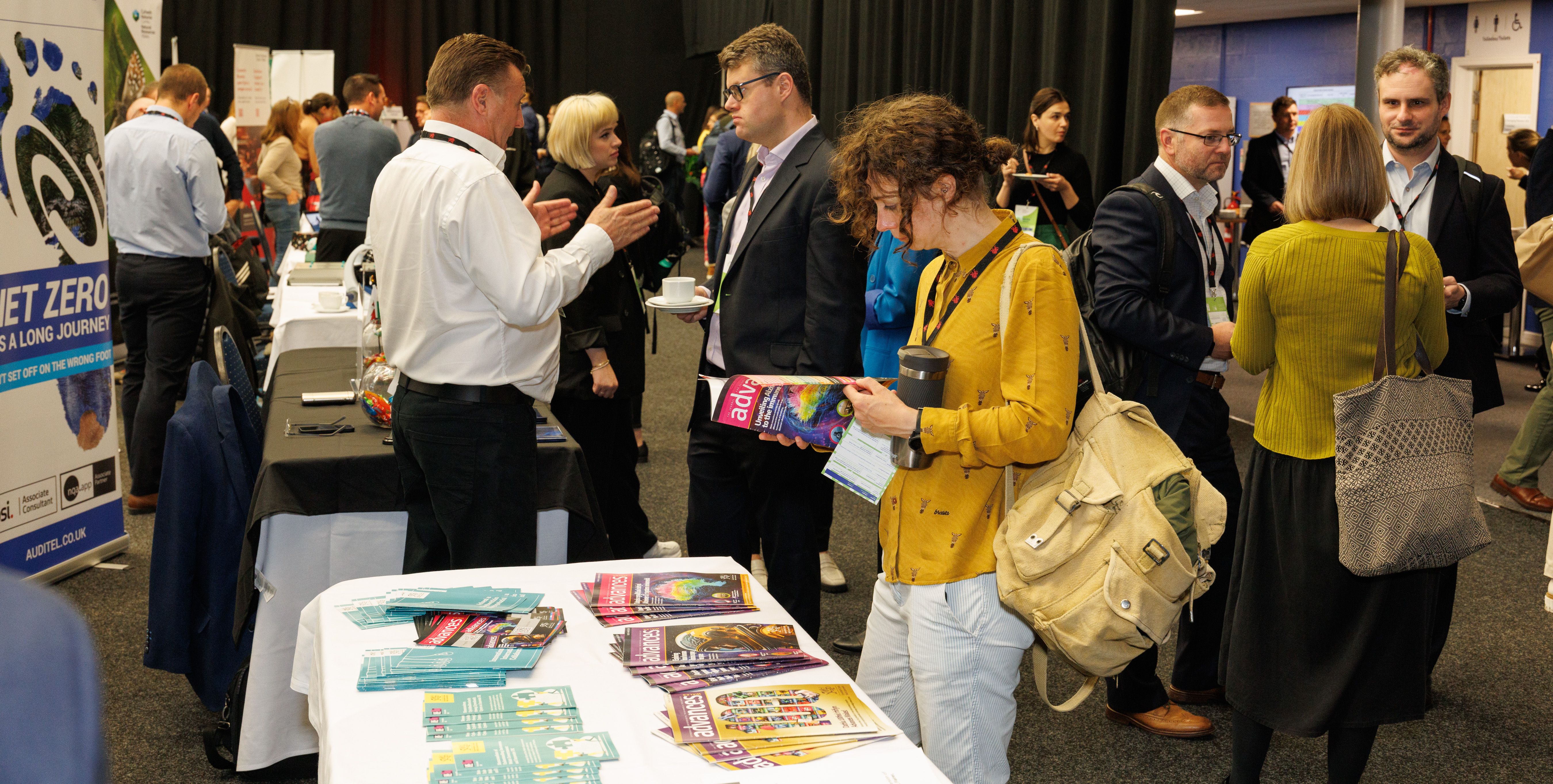 Delegates explore the exhibition.