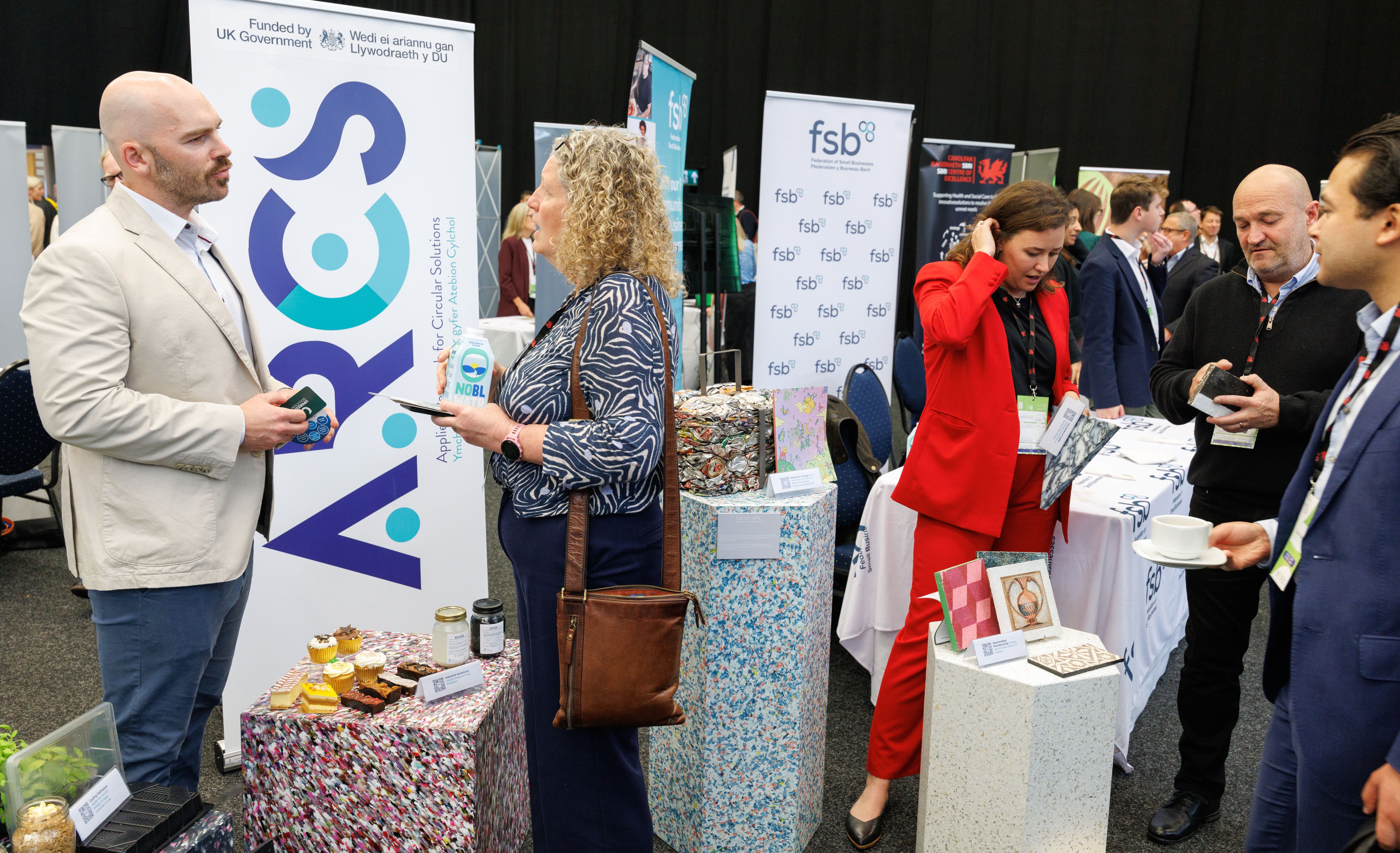 Delegates networking at the exhibition.