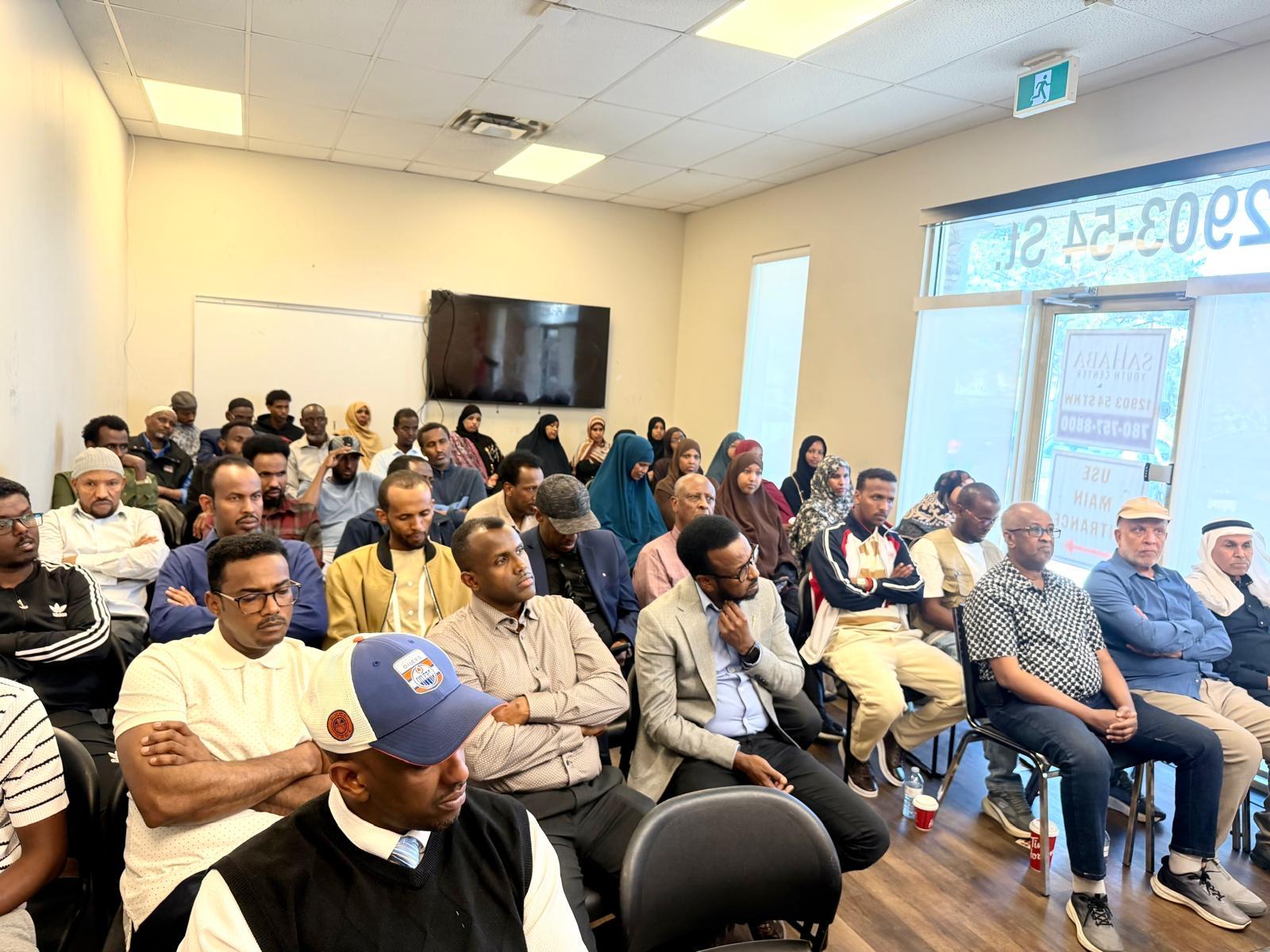 A full room of community members listens during a SISSA Anti-Racism & Social Inclusion session.