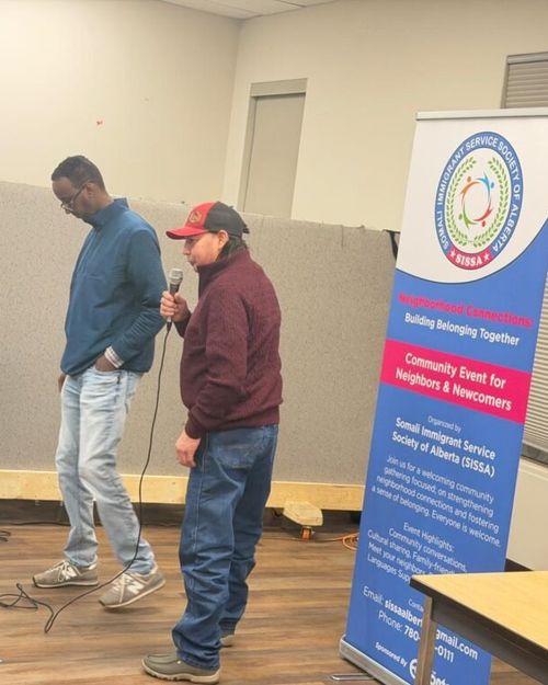 Attendees in conversation at SISSA's Neighbourhood Connections event.