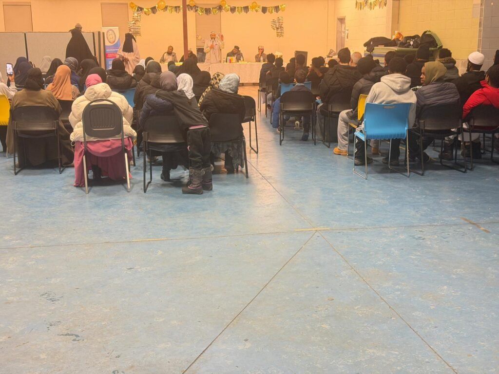 A presenter sharing winter safety information at SISSA's Immigrant Winter Safety event.