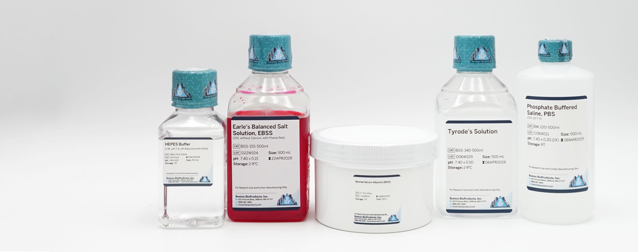 Cell culture buffer solutions and laboratory reagent bottles in a cell culture lab
