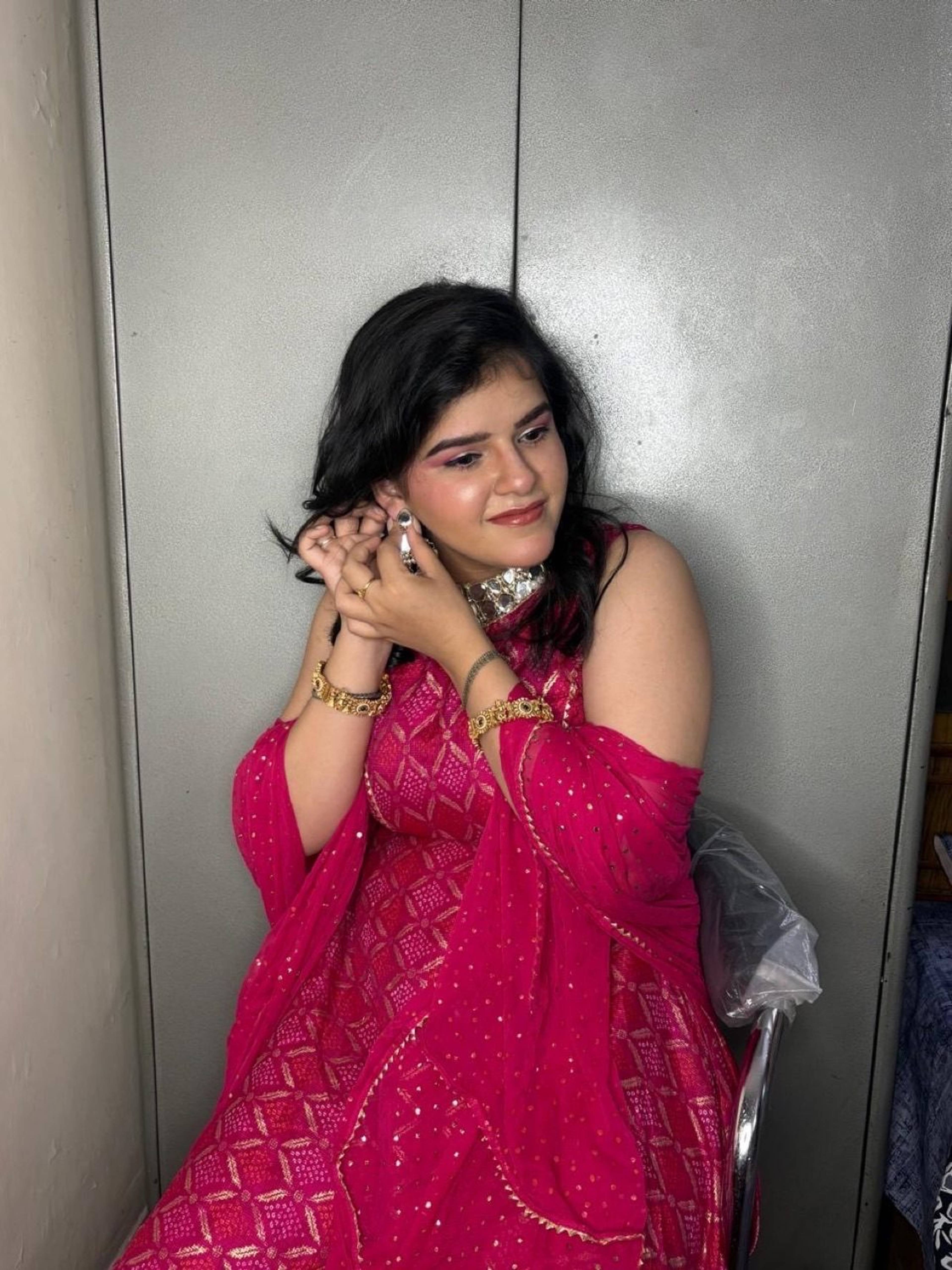 Festive party makeup with pink shimmer eyeshadow and glowing skin, by Priya Maleri