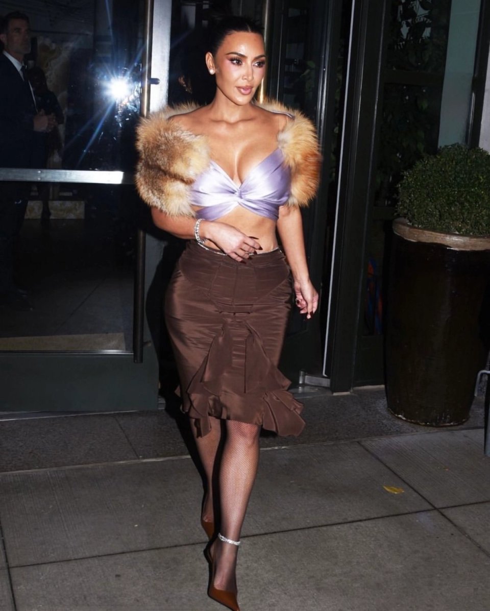 Kim Kardashian Styles a Chocolate Ruffle Skirt As Seen on the All's Fair Press Tour Kim Kardashian Styles a Chocolate Ruffle Skirt As Seen on the All's Fair Press Tour