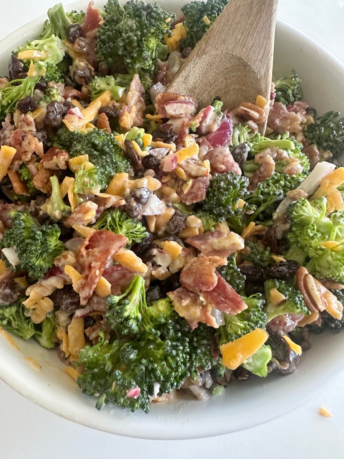 Broccoli raisin salad with cheddar, bacon, pecans, and raisins