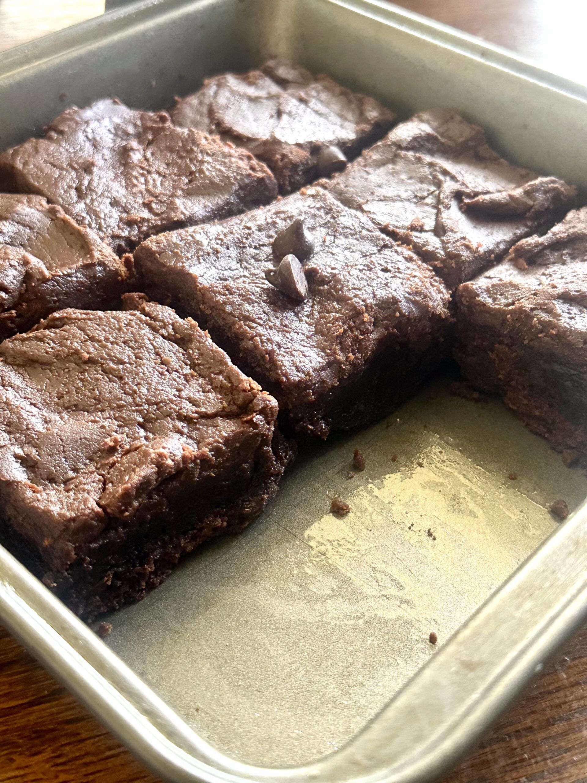 Pan of baked Guinness brownies ready for fudge icing