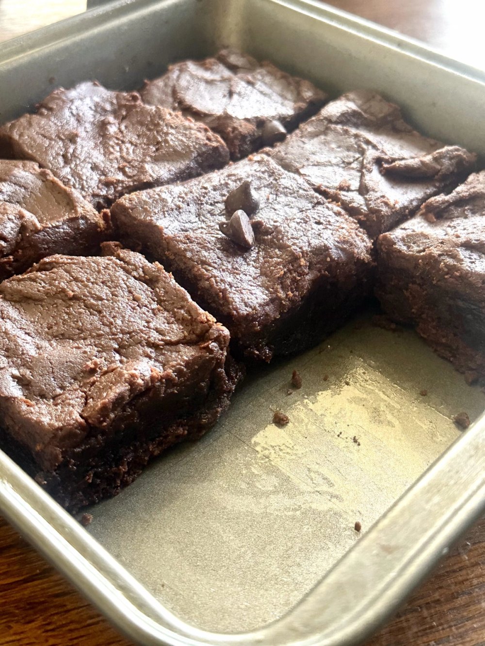 Pan of baked Guinness brownies ready for fudge icing
