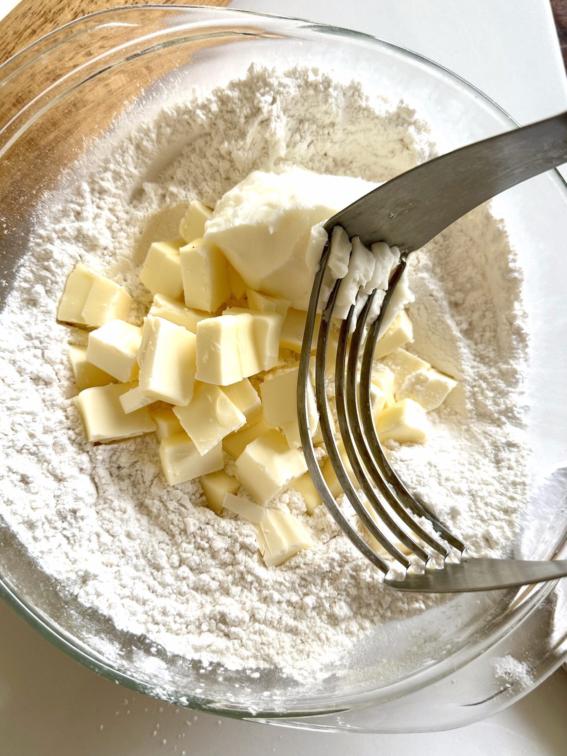 Cold butter and shortening cut into flour for flaky pie crust