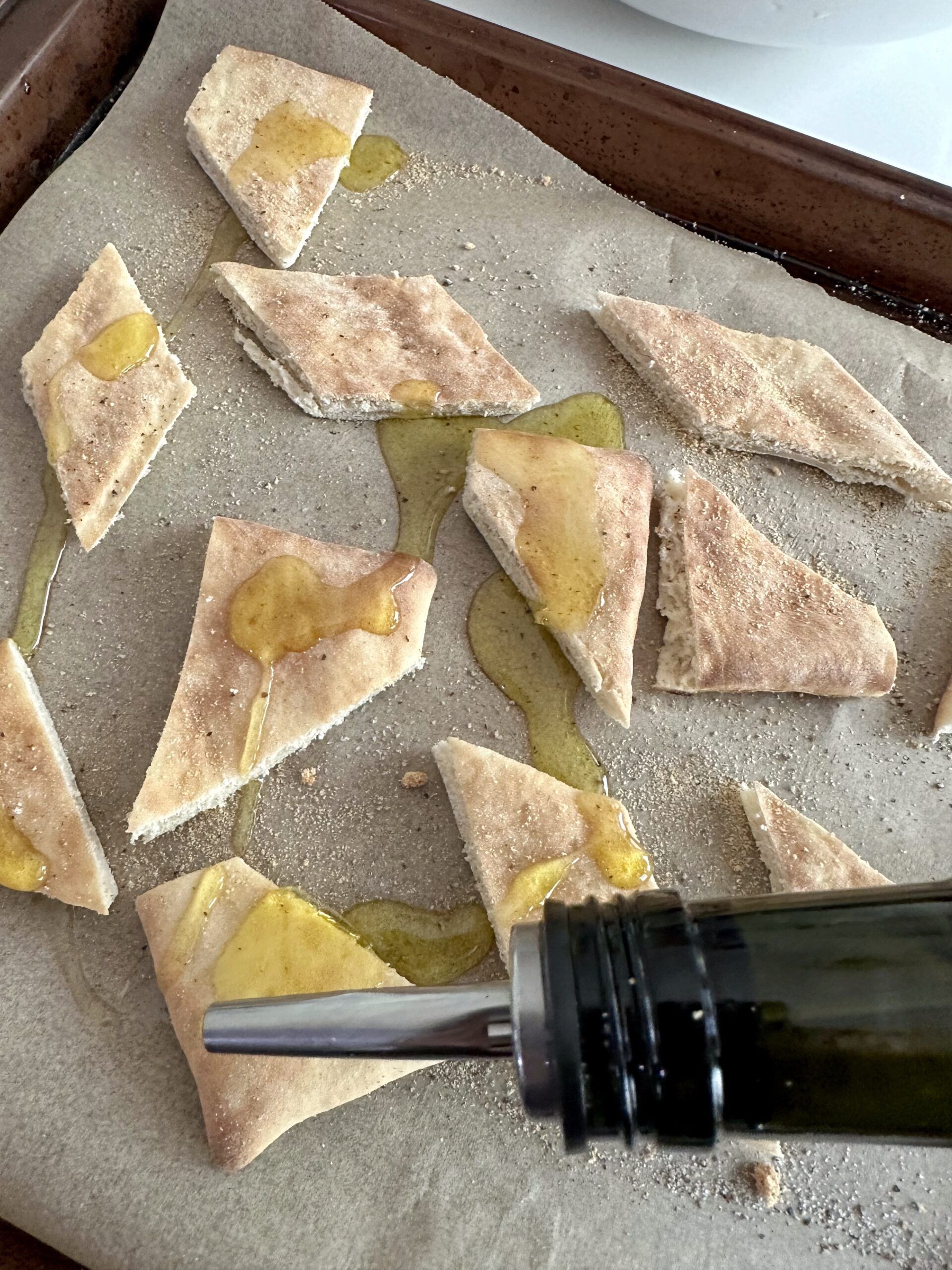 Seasoned pita pieces ready to bake for Green Jacket Salad