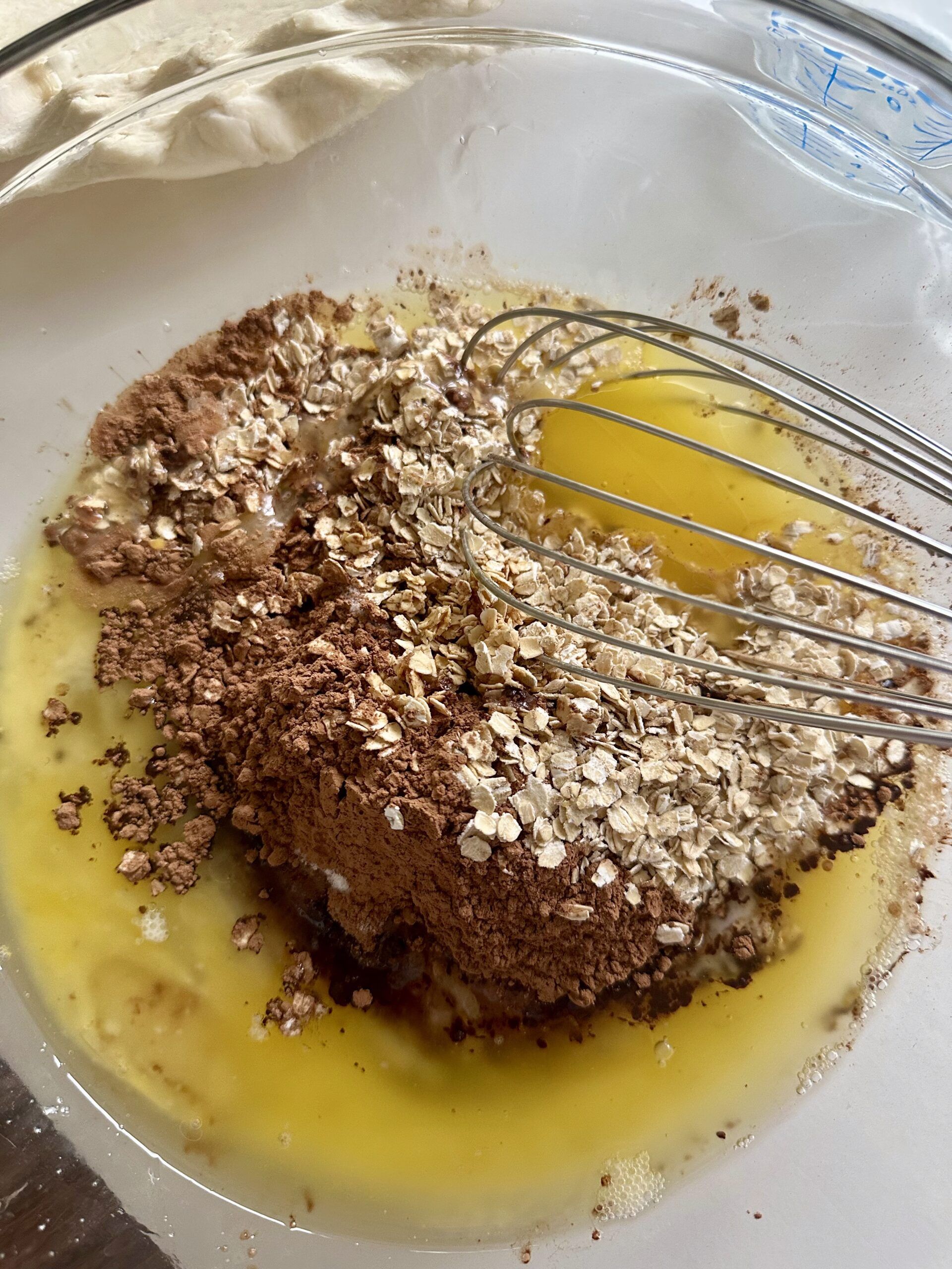 Smooth chocolate fudge pie filling in a mixing bowl