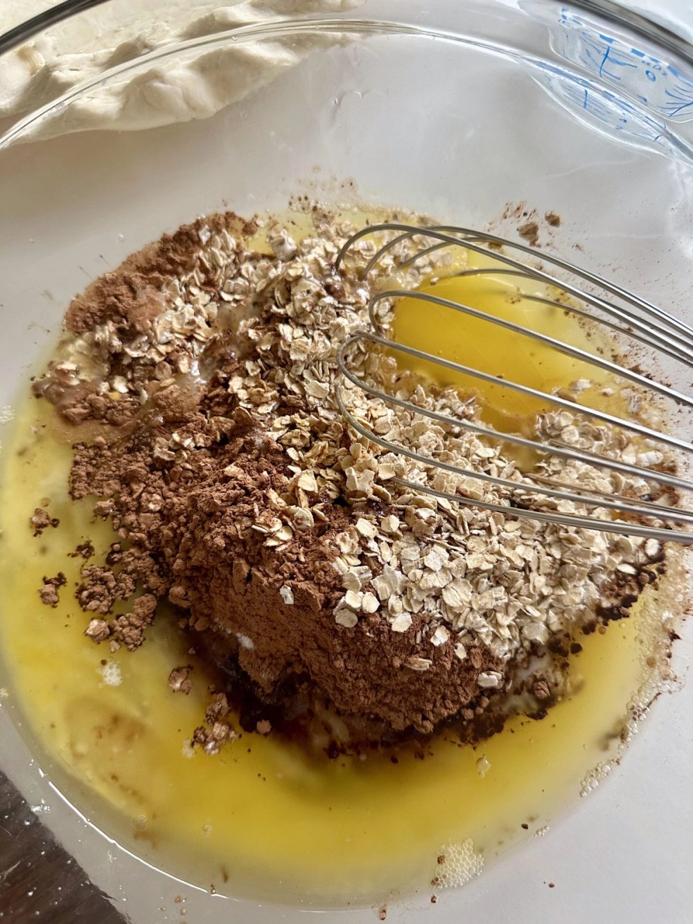 Smooth chocolate fudge pie filling in a mixing bowl
