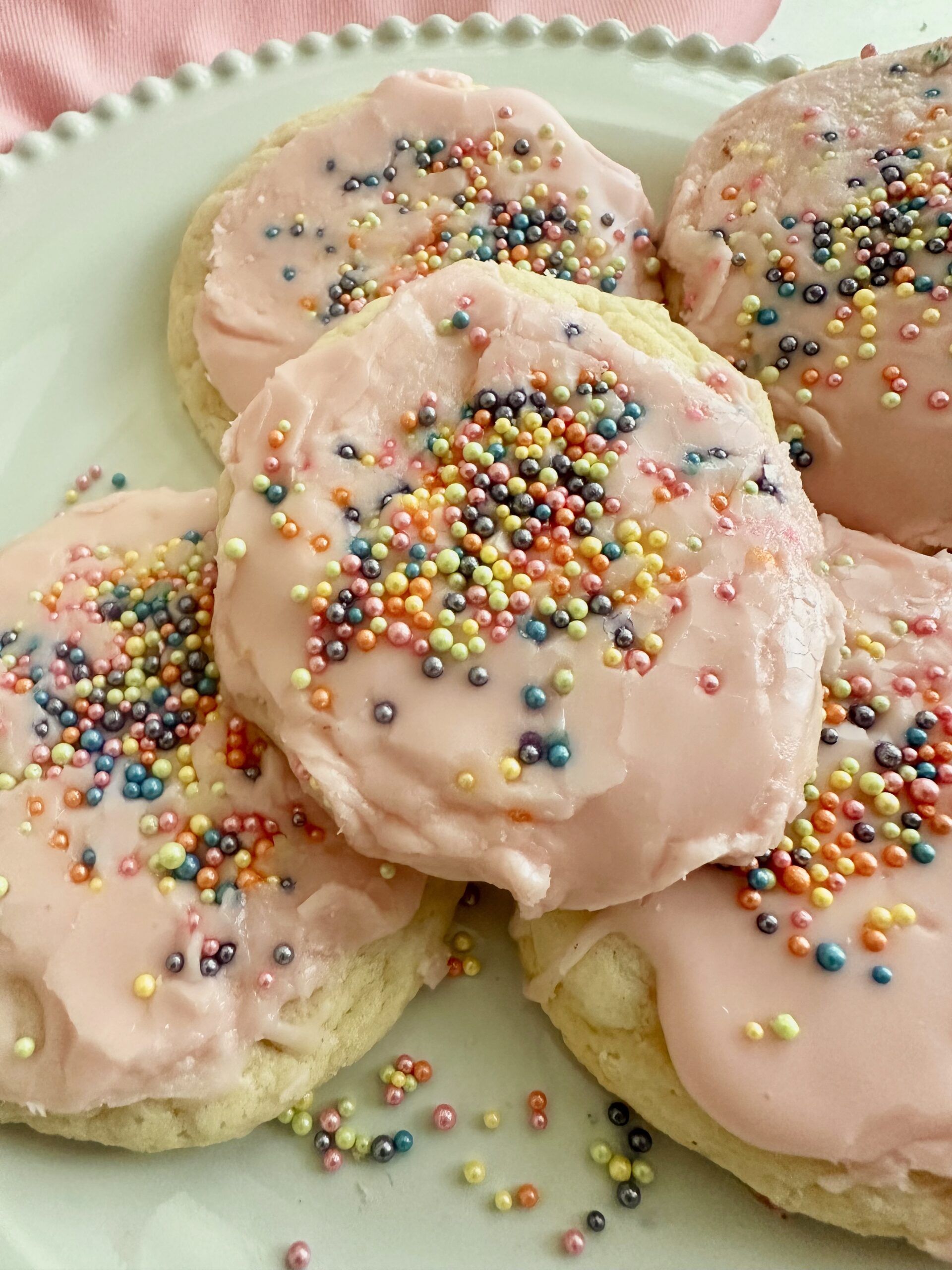 Decorated cake mix cookies arranged for serving and storage
