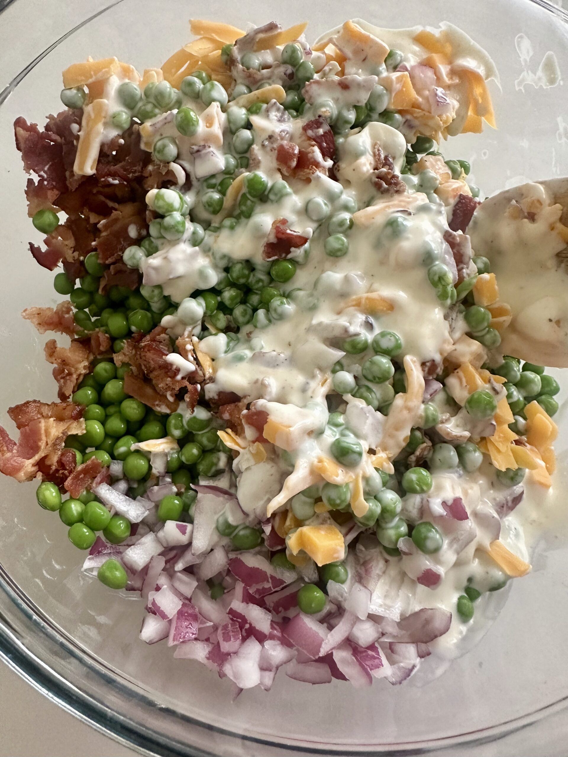 Southern pea salad gently folded together before chilling