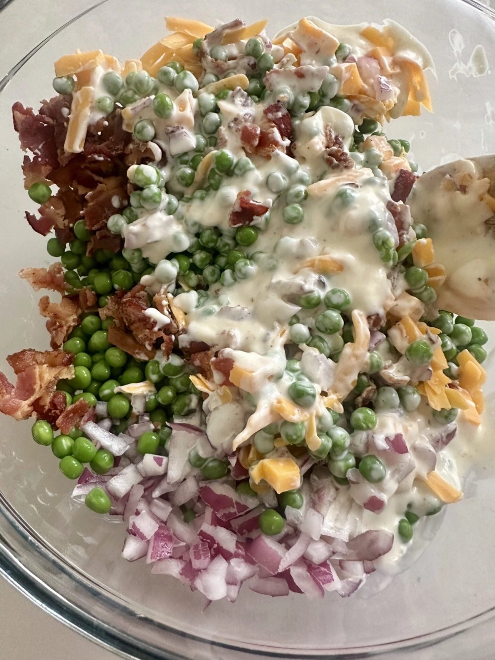 Southern pea salad gently folded together before chilling