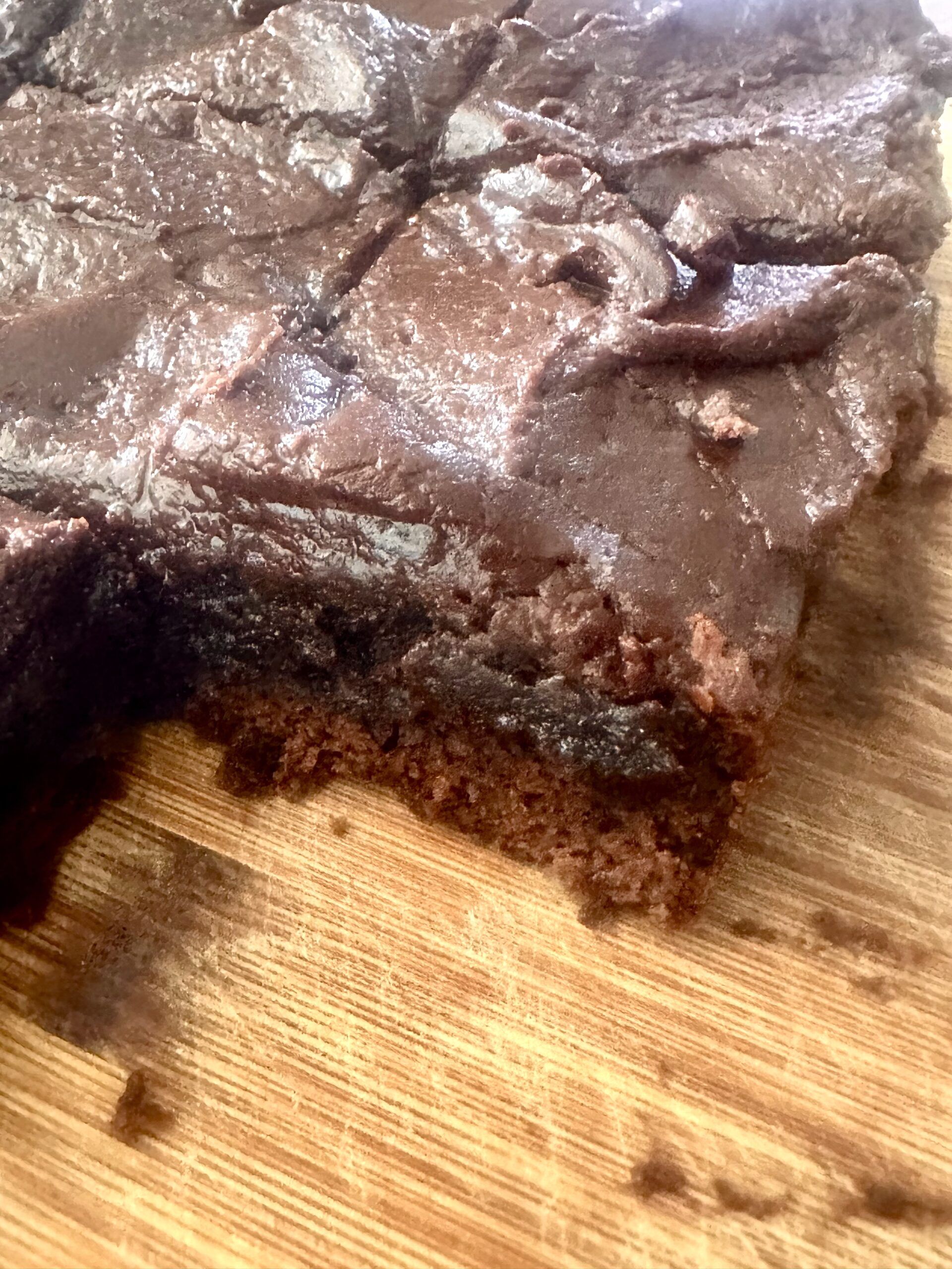 Fudgy Guinness brownie slices showing a moist chocolate center