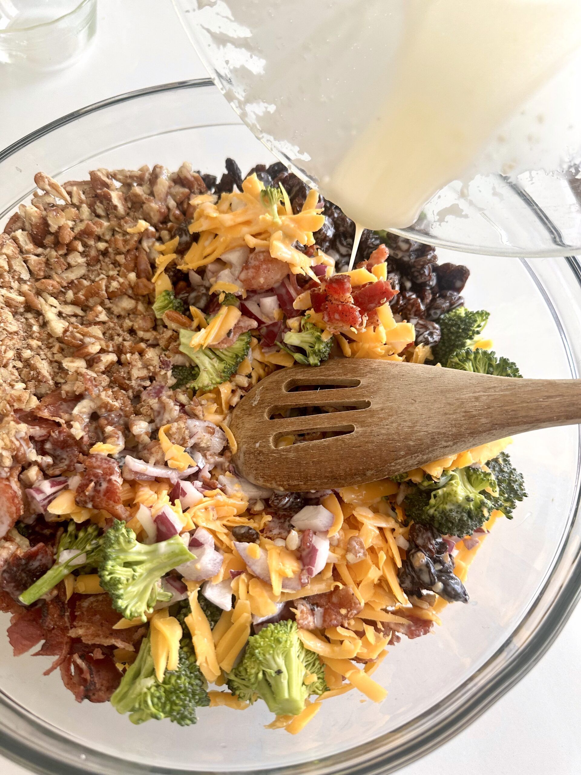 Broccoli raisin salad tossed with creamy dressing