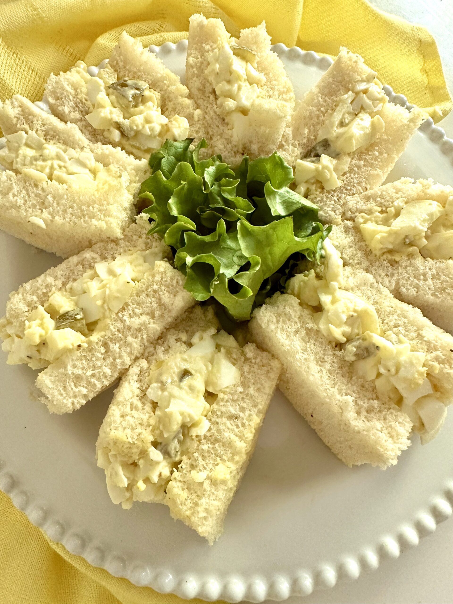 A tray of Southern egg salad tea sandwiches