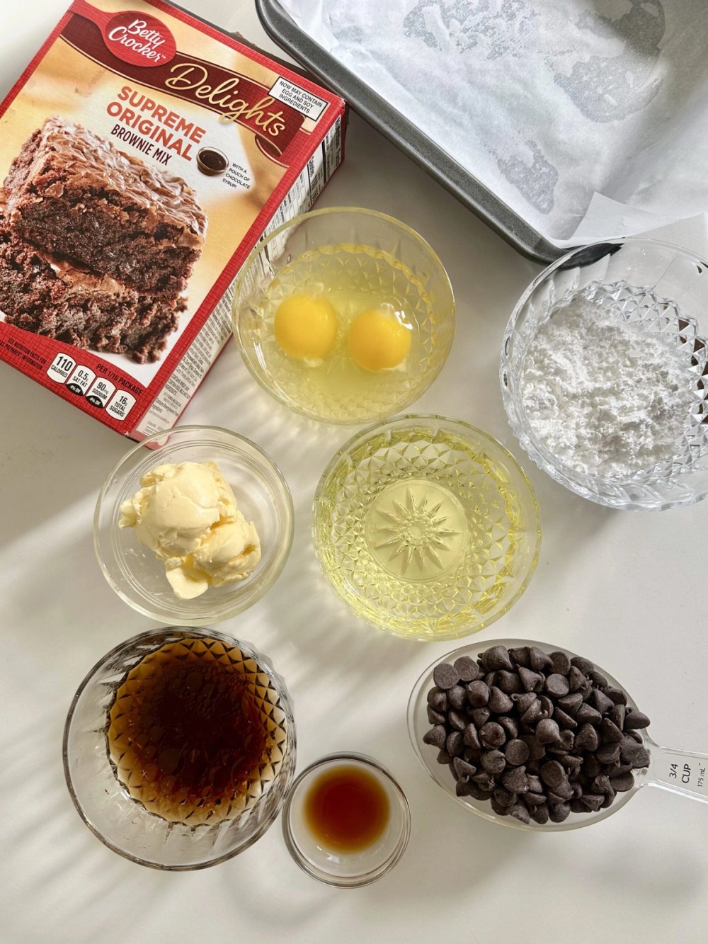 Chocolate chips, butter, Guinness, powdered sugar, and vanilla for brownie icing
