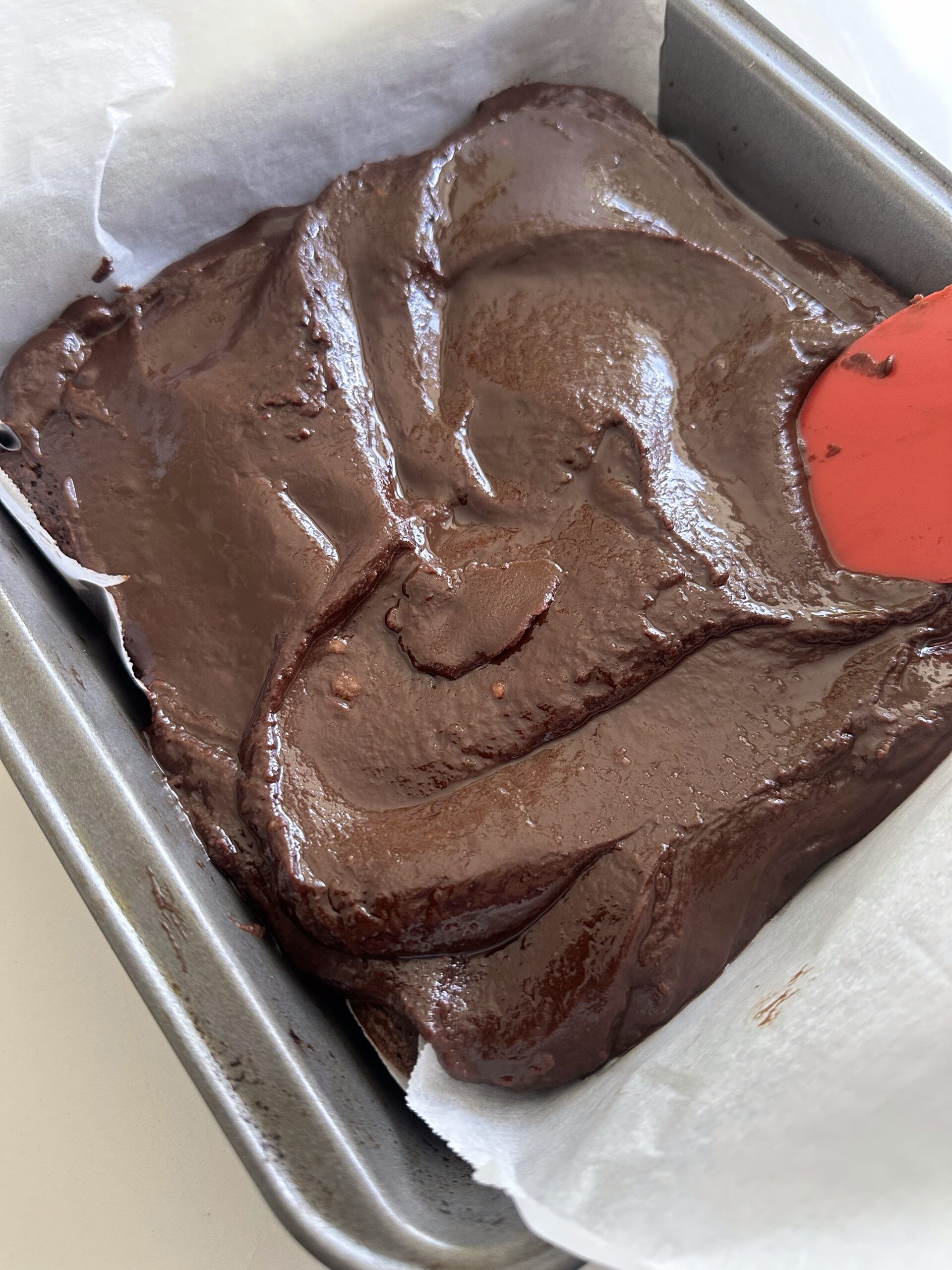 Guinness brownies covered with glossy chocolate fudge icing