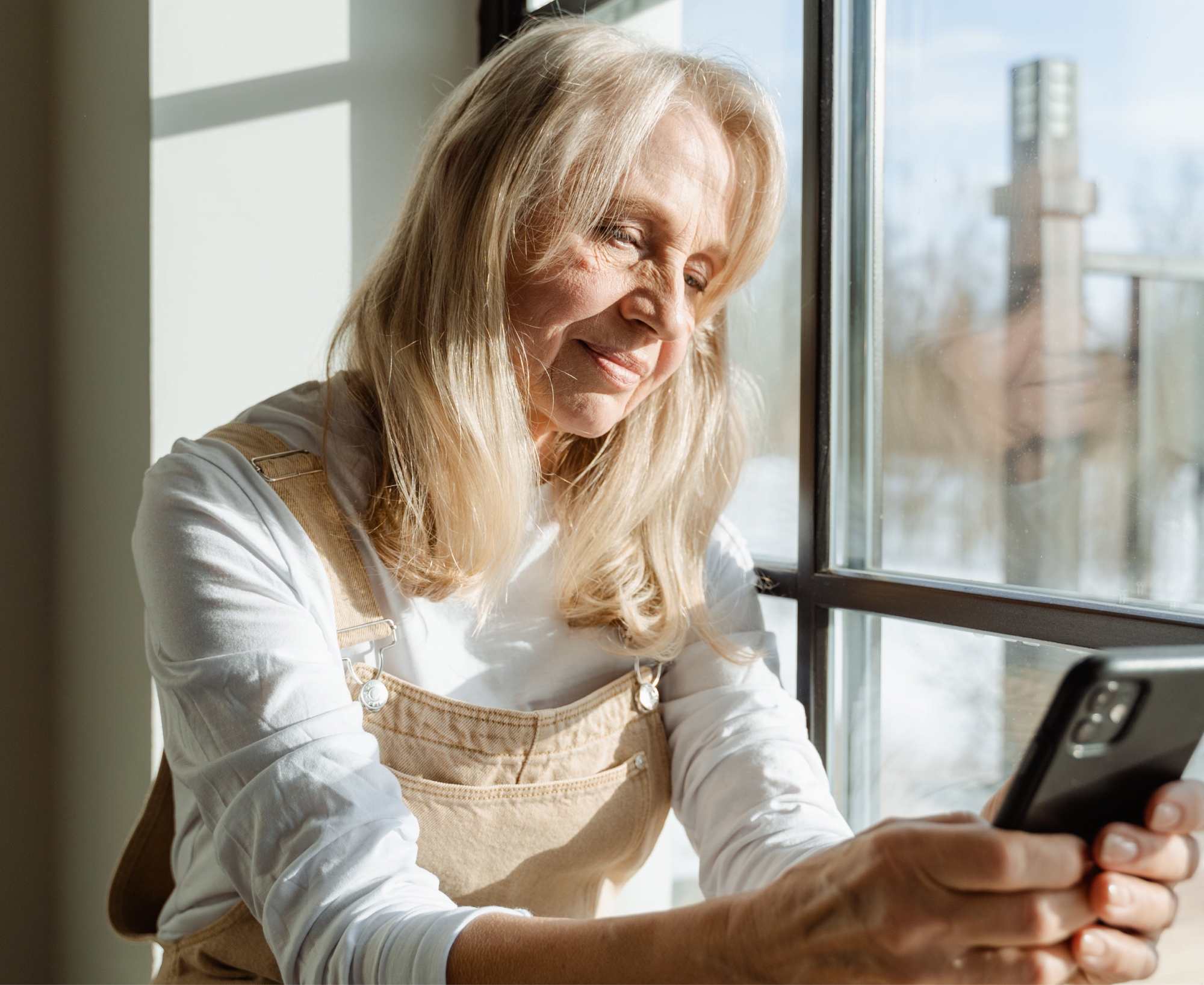 Woman looking at her cell phone