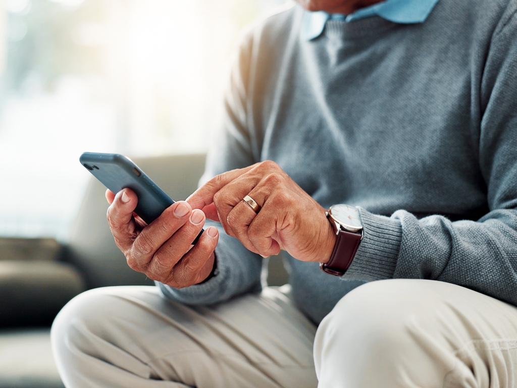 Man using smartphone for support
