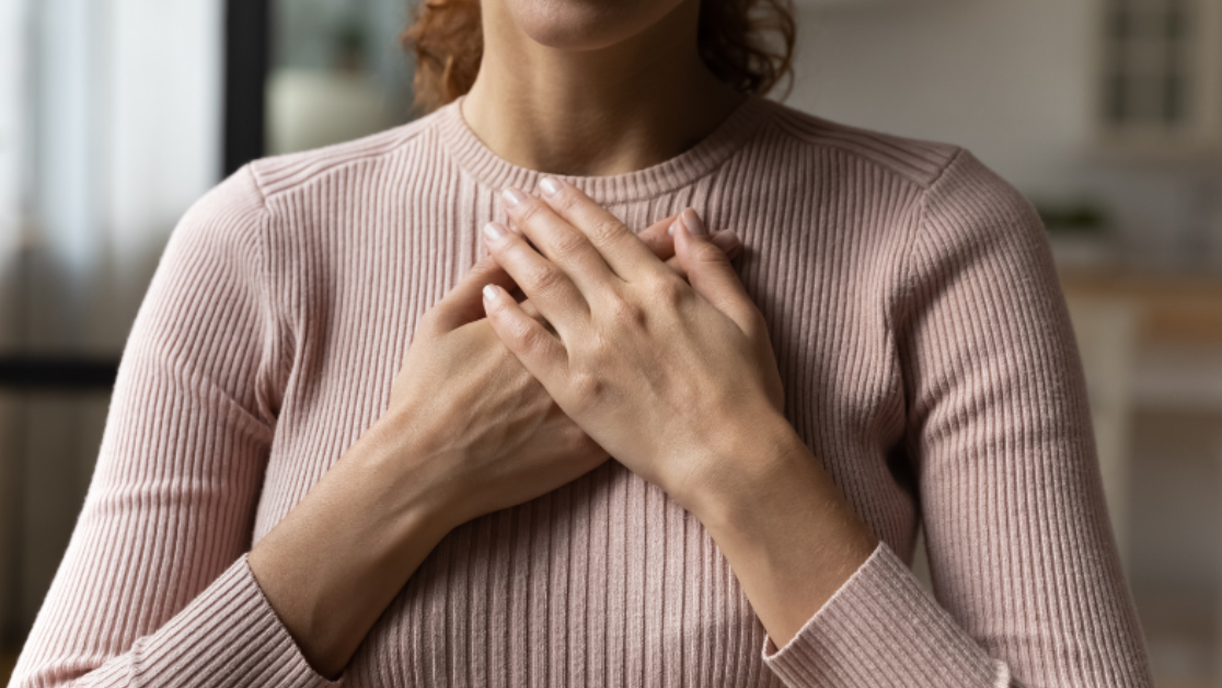 HCM Patient Holding Heart