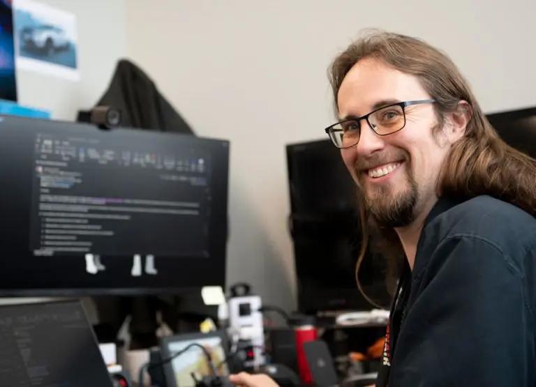 Anthony Franta working on a computer