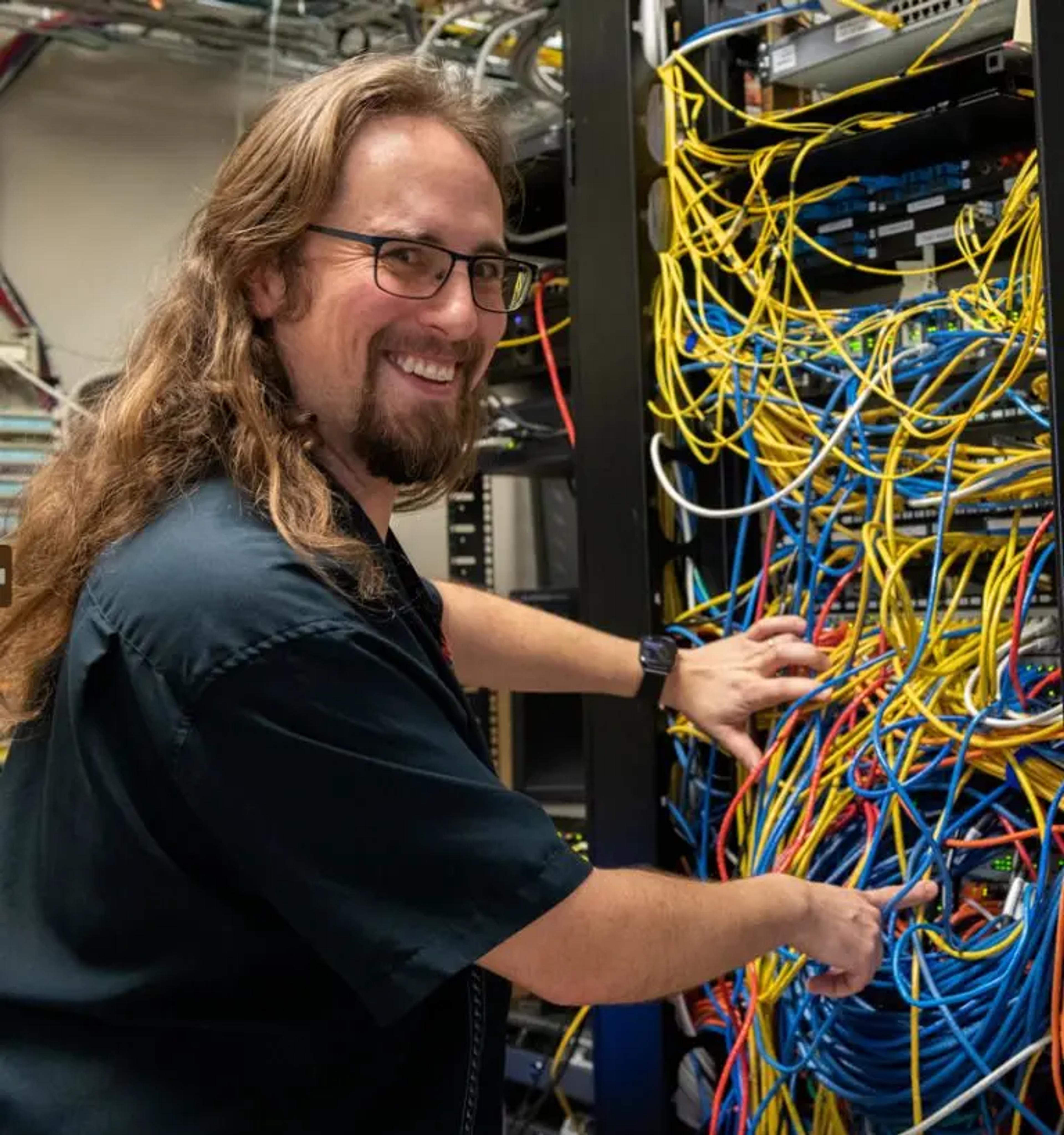 Anthony Franta working on a server
