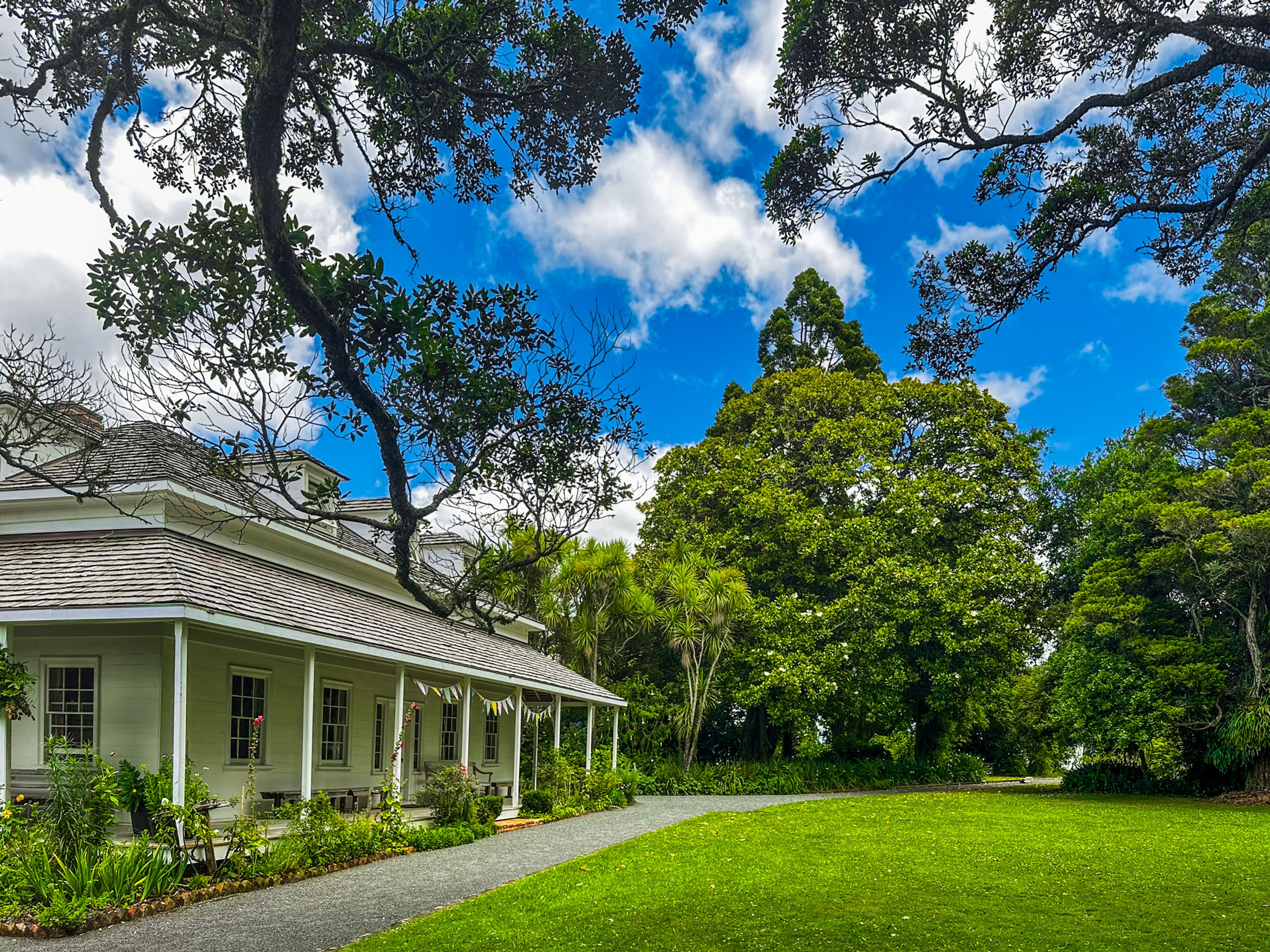 the mission house amongst mature trees at Waimate North