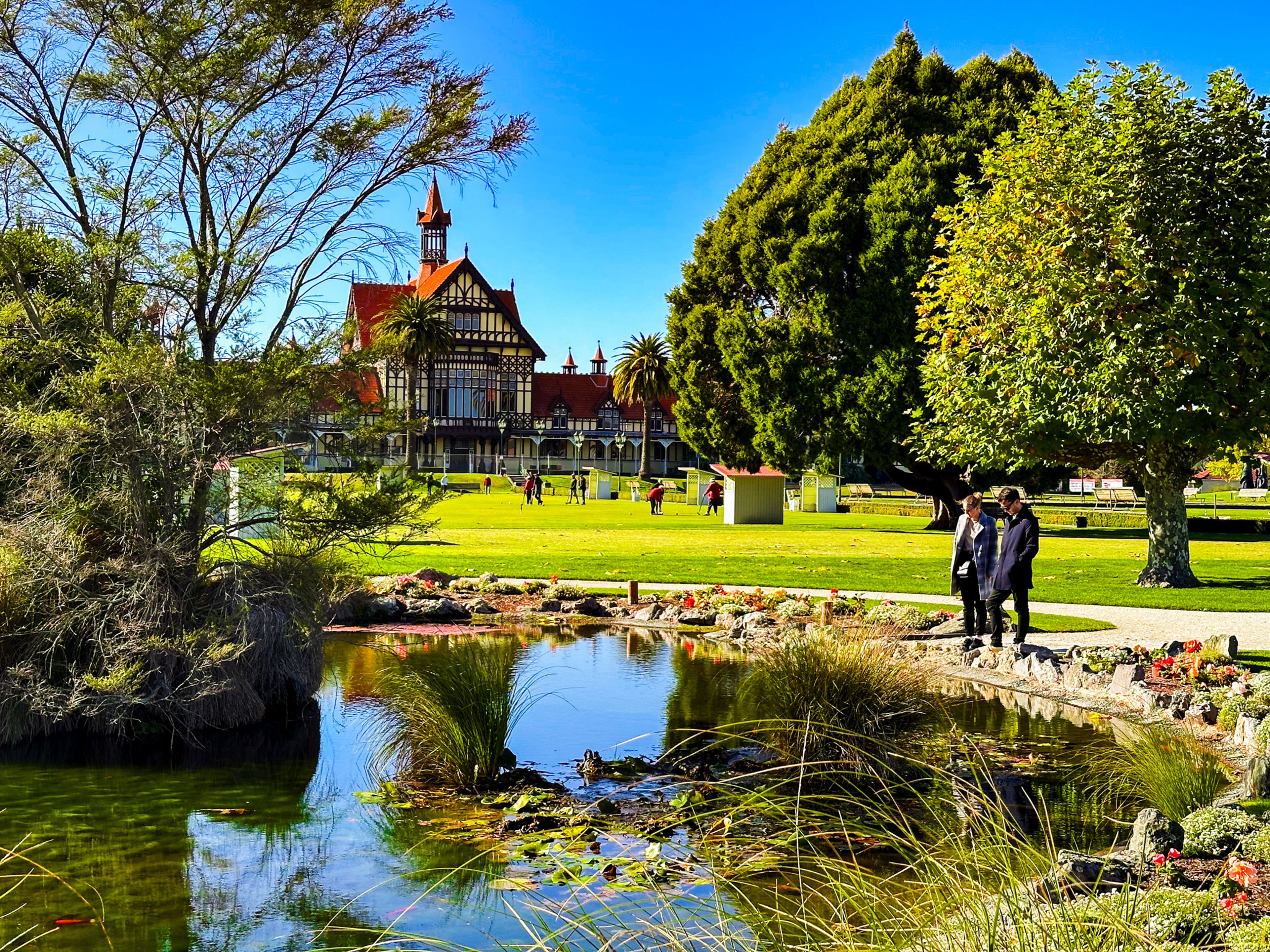 looking across one of the ponds to the Rotorua Meseum building