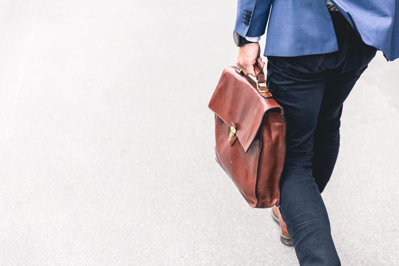 businessman walking with a briefcase