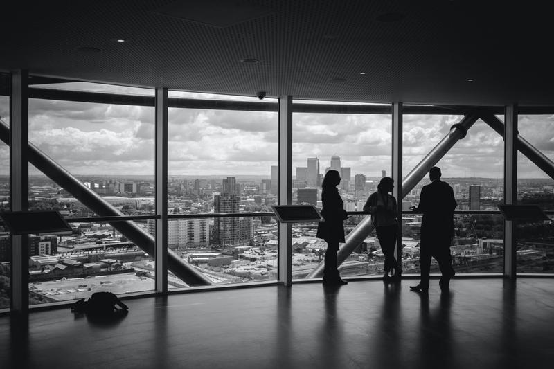 three people discussing struggling businesses