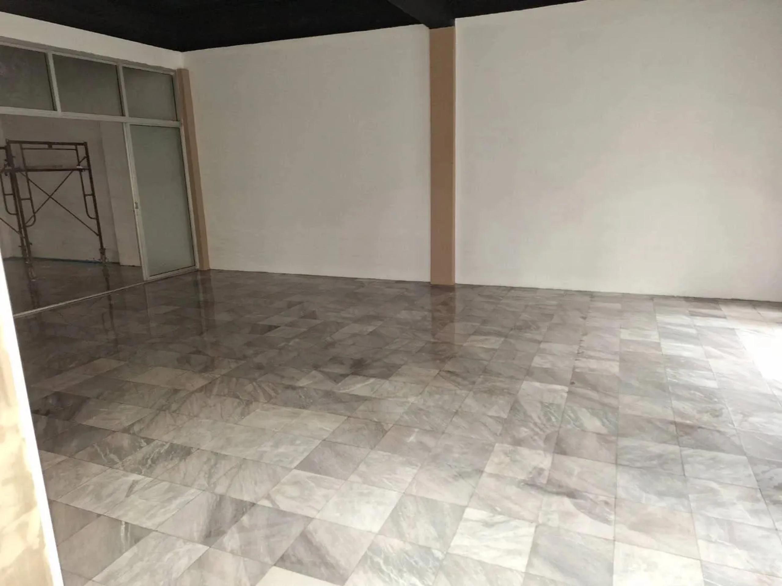 Warehouse office floor tile installation