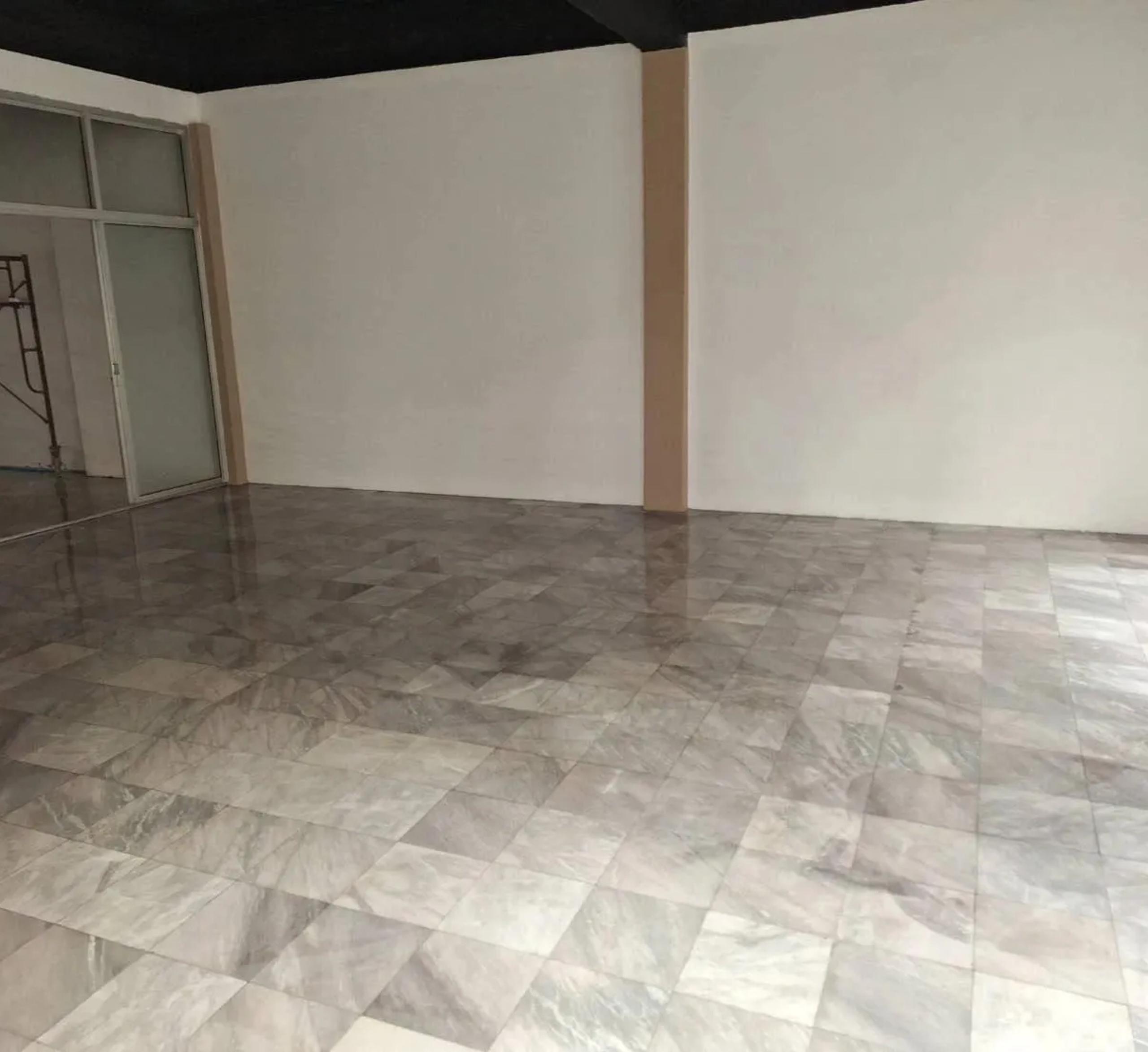 Warehouse office floor tile installation