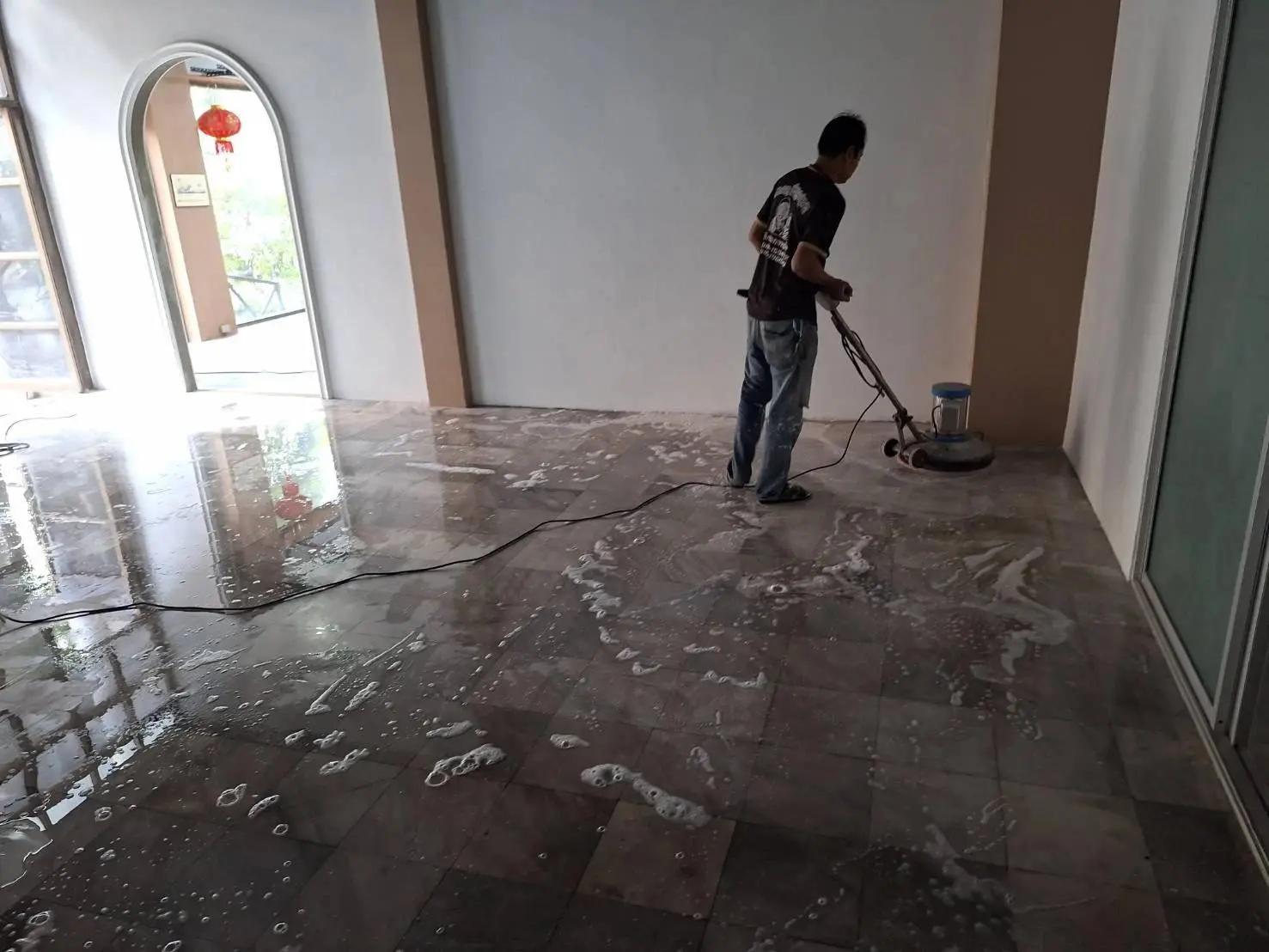 Cleaning the floor after warehouse office tile installation