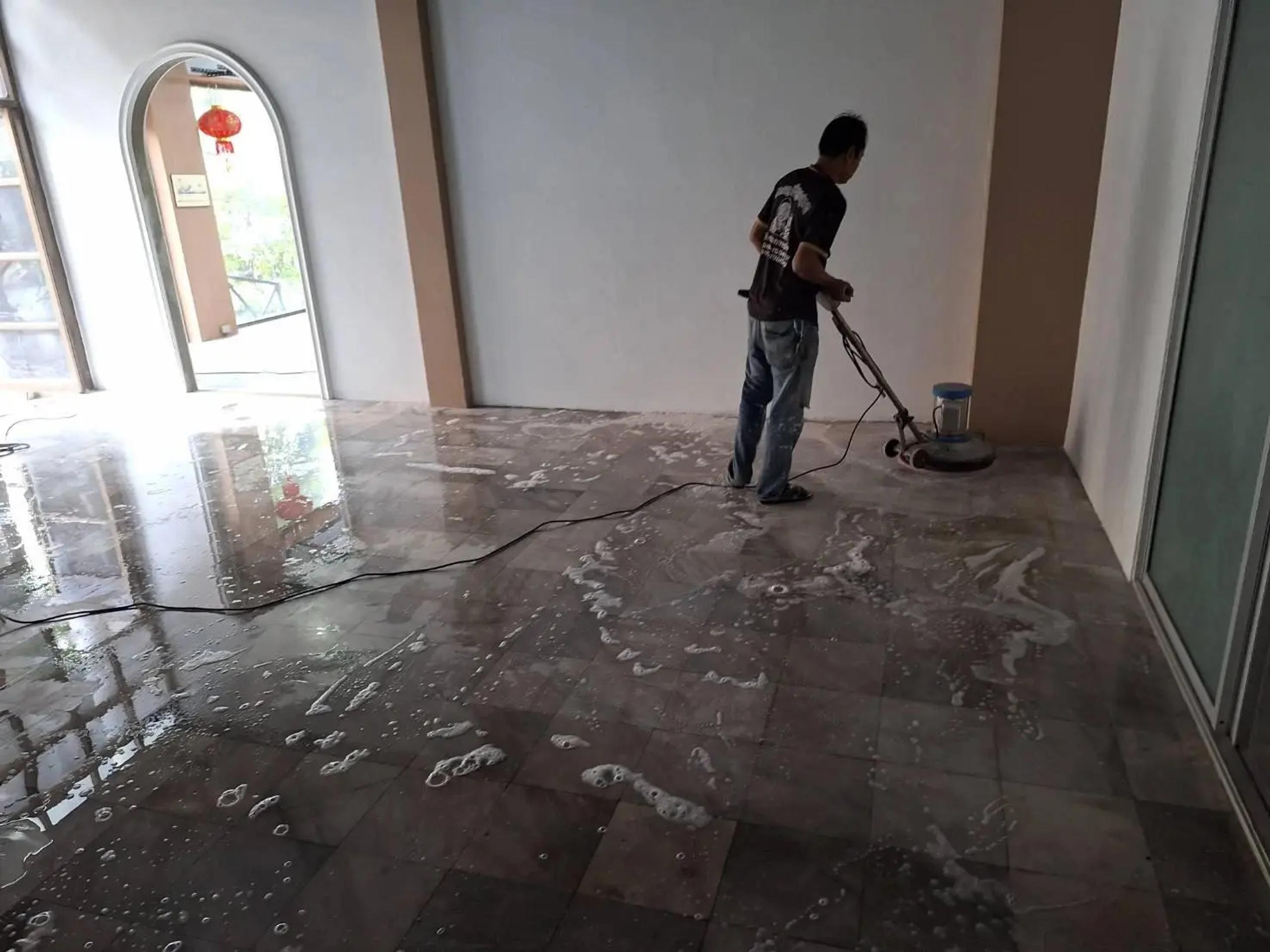 Cleaning the floor after warehouse office tile installation
