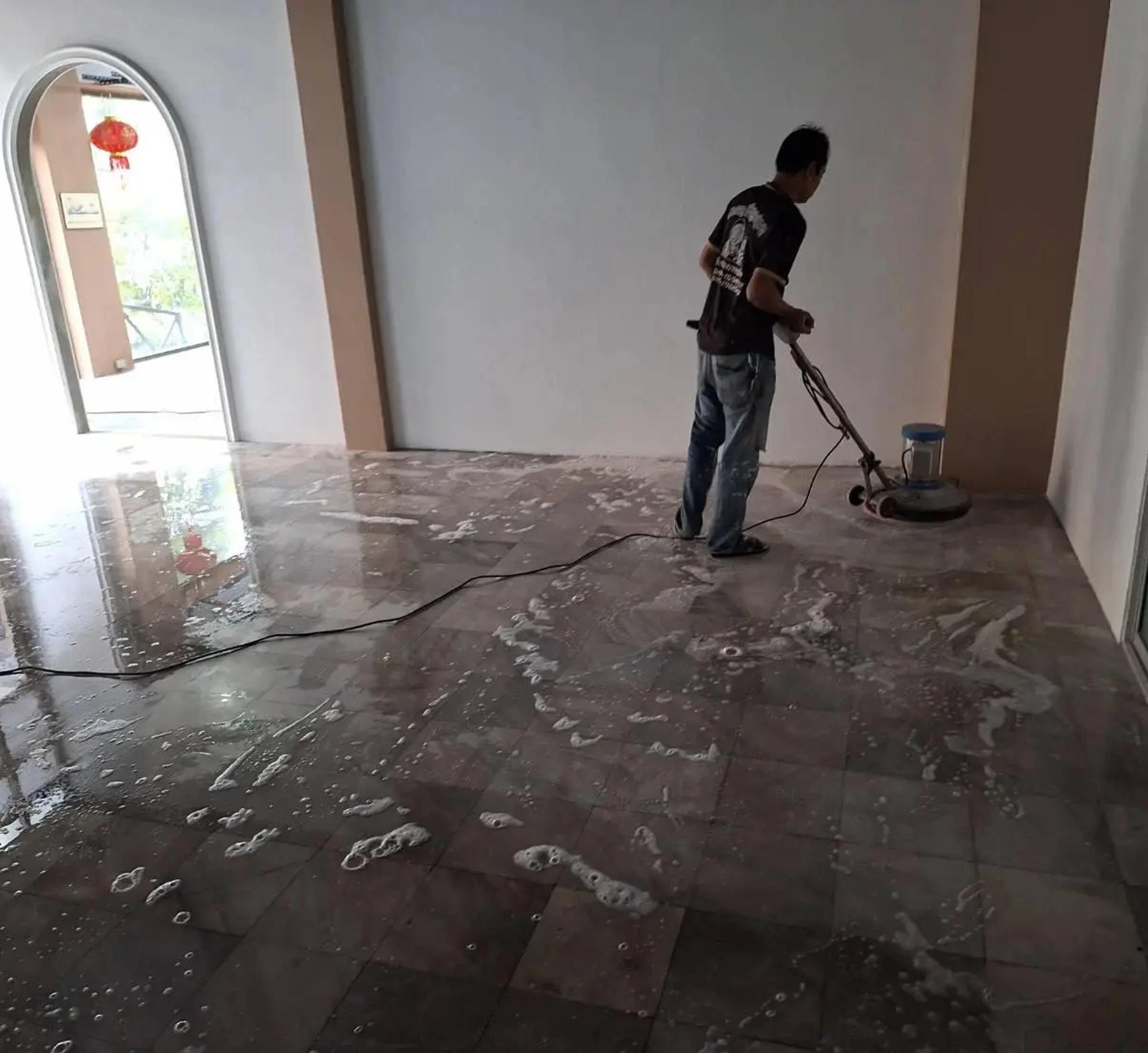 Cleaning the floor after warehouse office tile installation